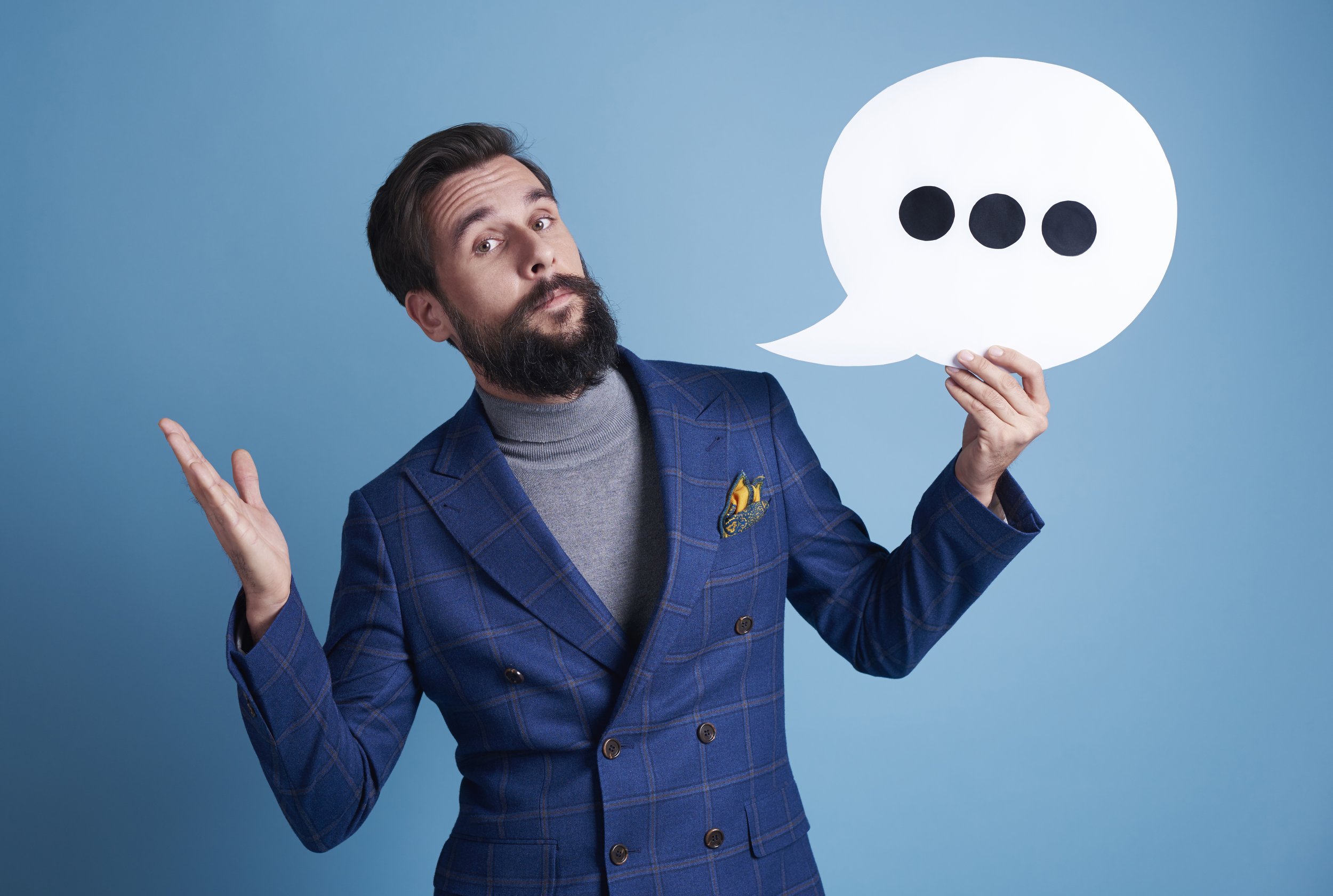 businessman-holding-speech-bubble.jpg