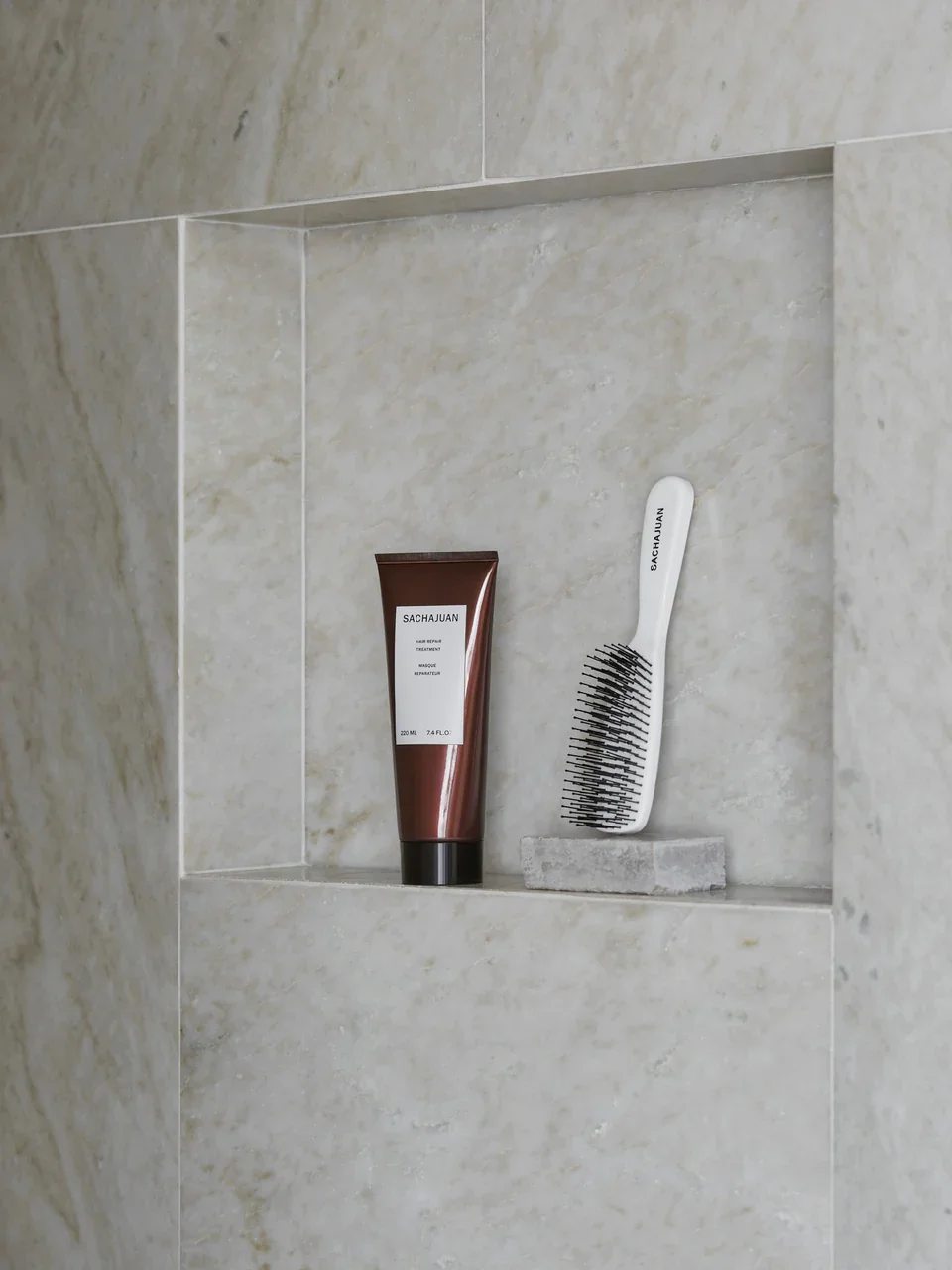 sachajuan detangling brush in shower.webp