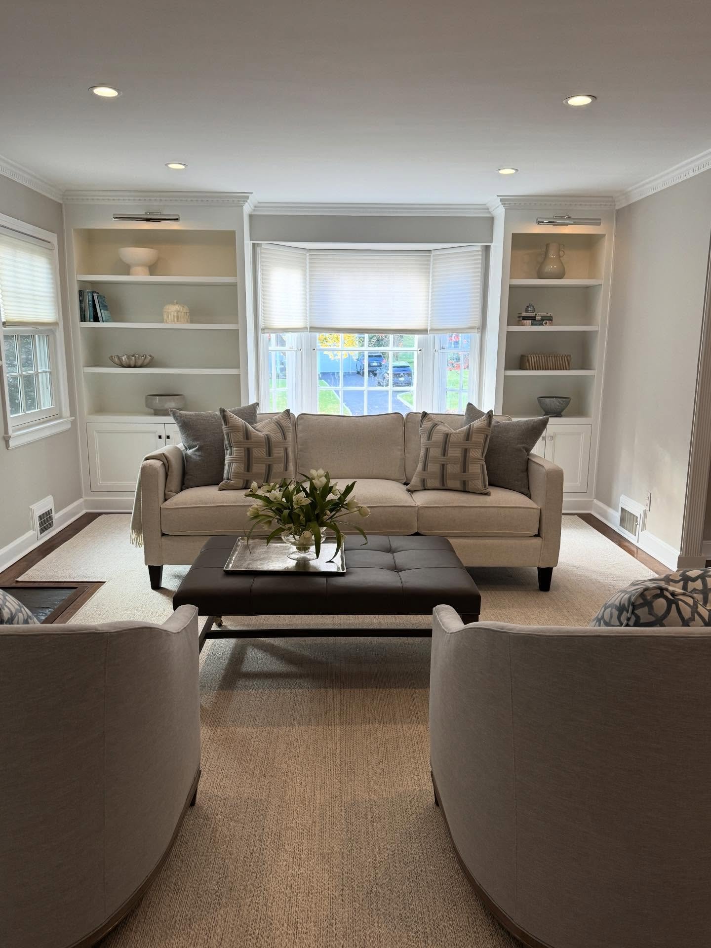 Brighter, lighter, more functional. This living room transformation brought custom built-ins, thoughtful lighting, and layered textures to create a space our client loves coming home to.

@jenniferkilgallendesign 

#custombuiltin #livingroom #ottoman