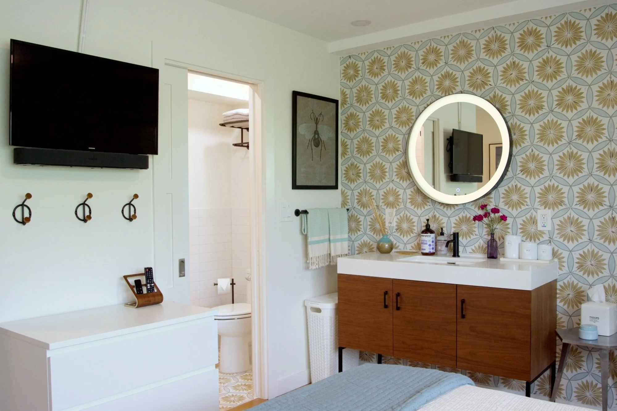 2nd Floor Bedroom with Ensuite Bathroom, which includes Private Shower & Toilet. Vanity Sink with Lighted Mirror, HDTV & Apple TV.