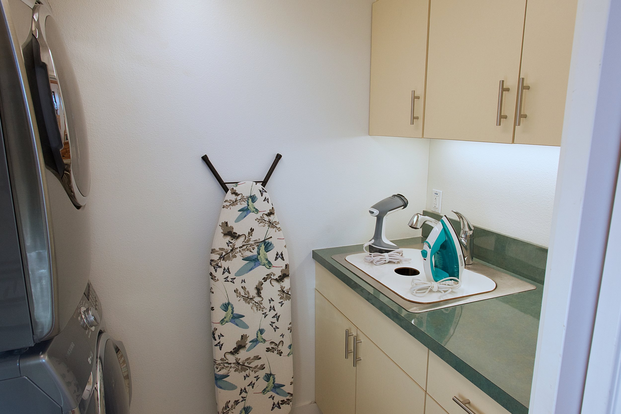 2nd Floor Laundry Room with Washer & Dryer, Ironing Board, Clothes Steamer, Iron and Drying Rack.