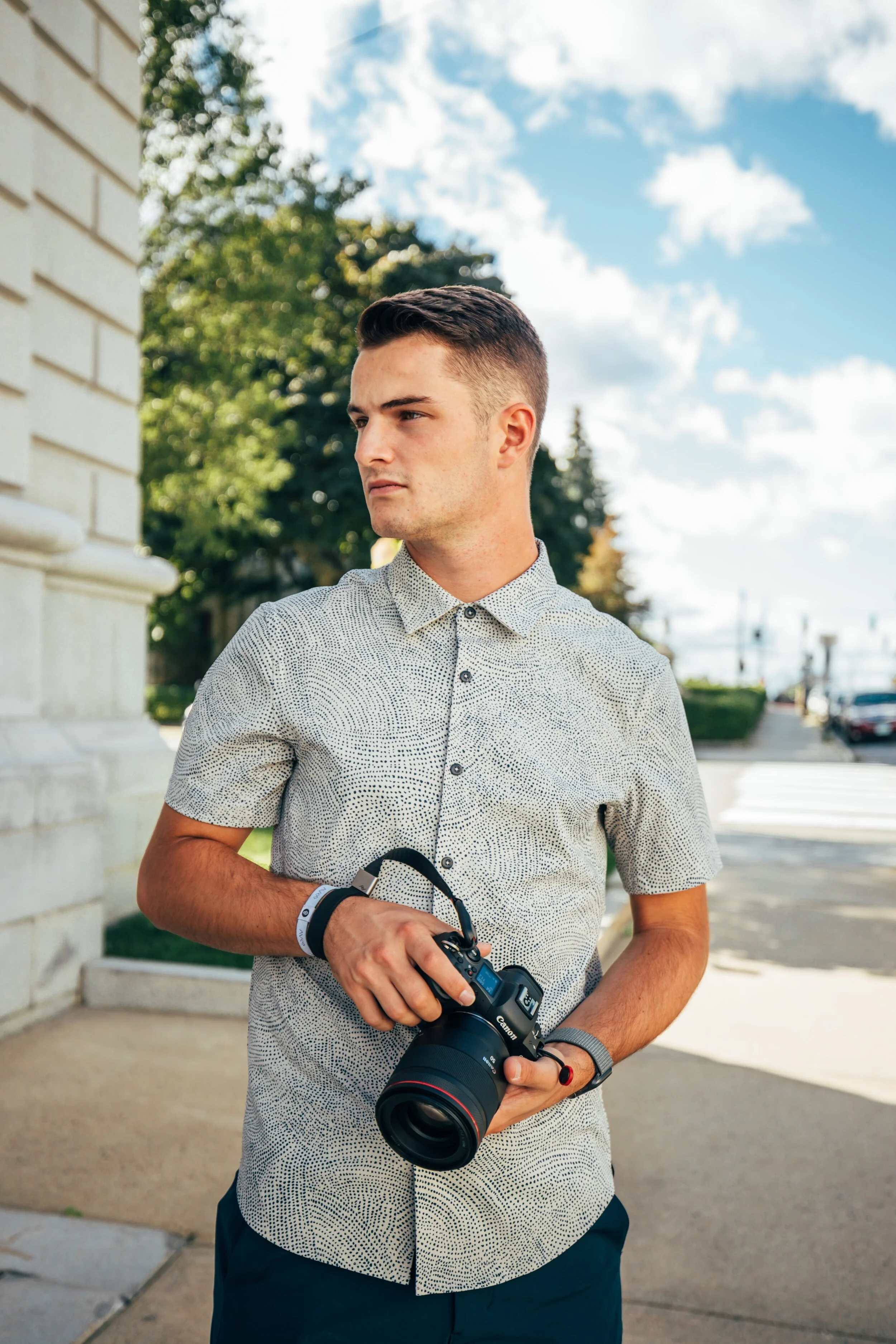 Dawson taking photos on set of a Navadise Media photoshoot