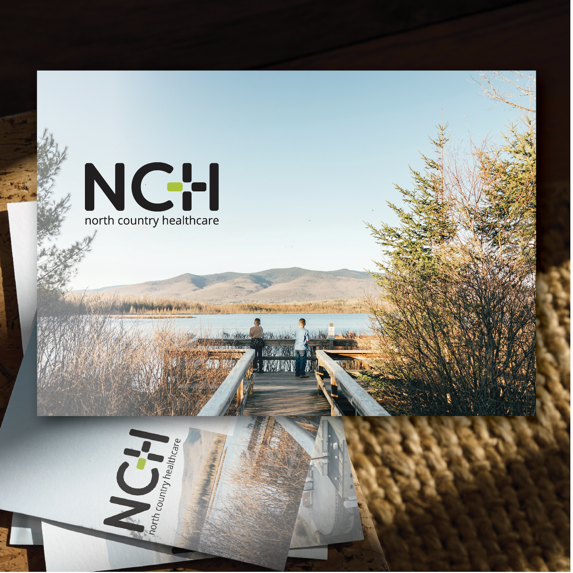 Mockup of NCH Mailer with aerial photo of Hospital location in Northern New Hampshire