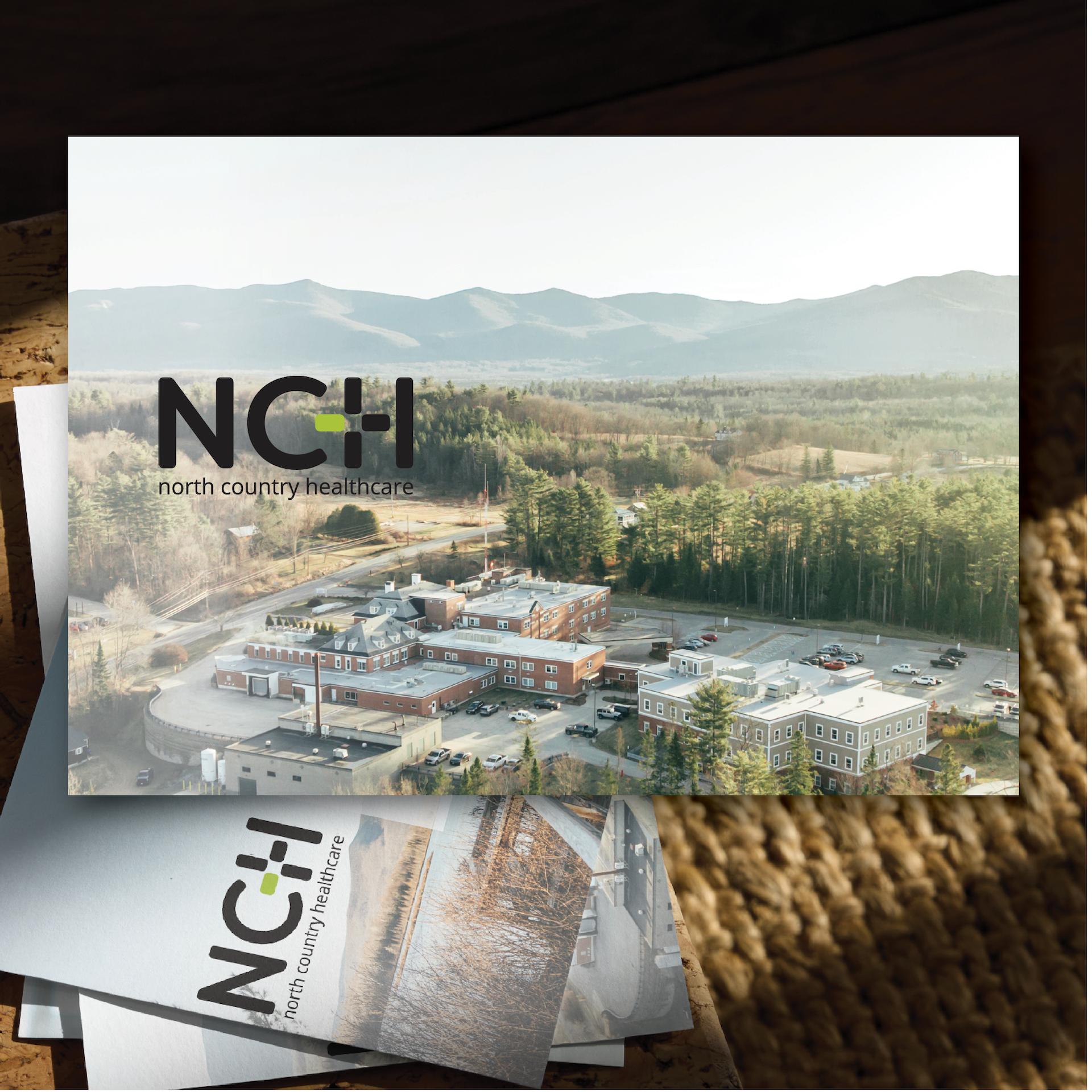 Mockup of NCH Mailer with aerial photo of Hospital location in Northern New Hampshire