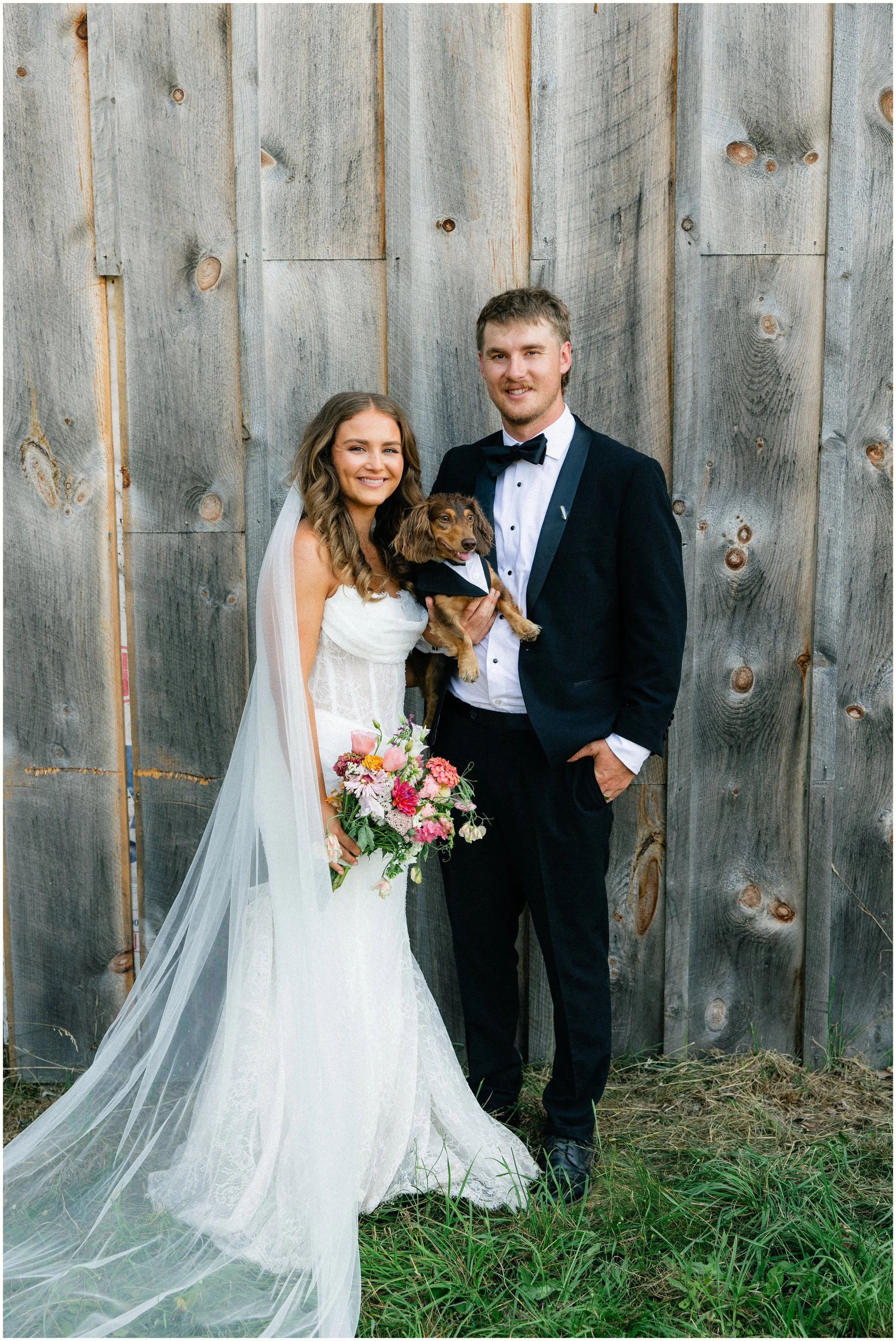 Bride and Groom with their dog