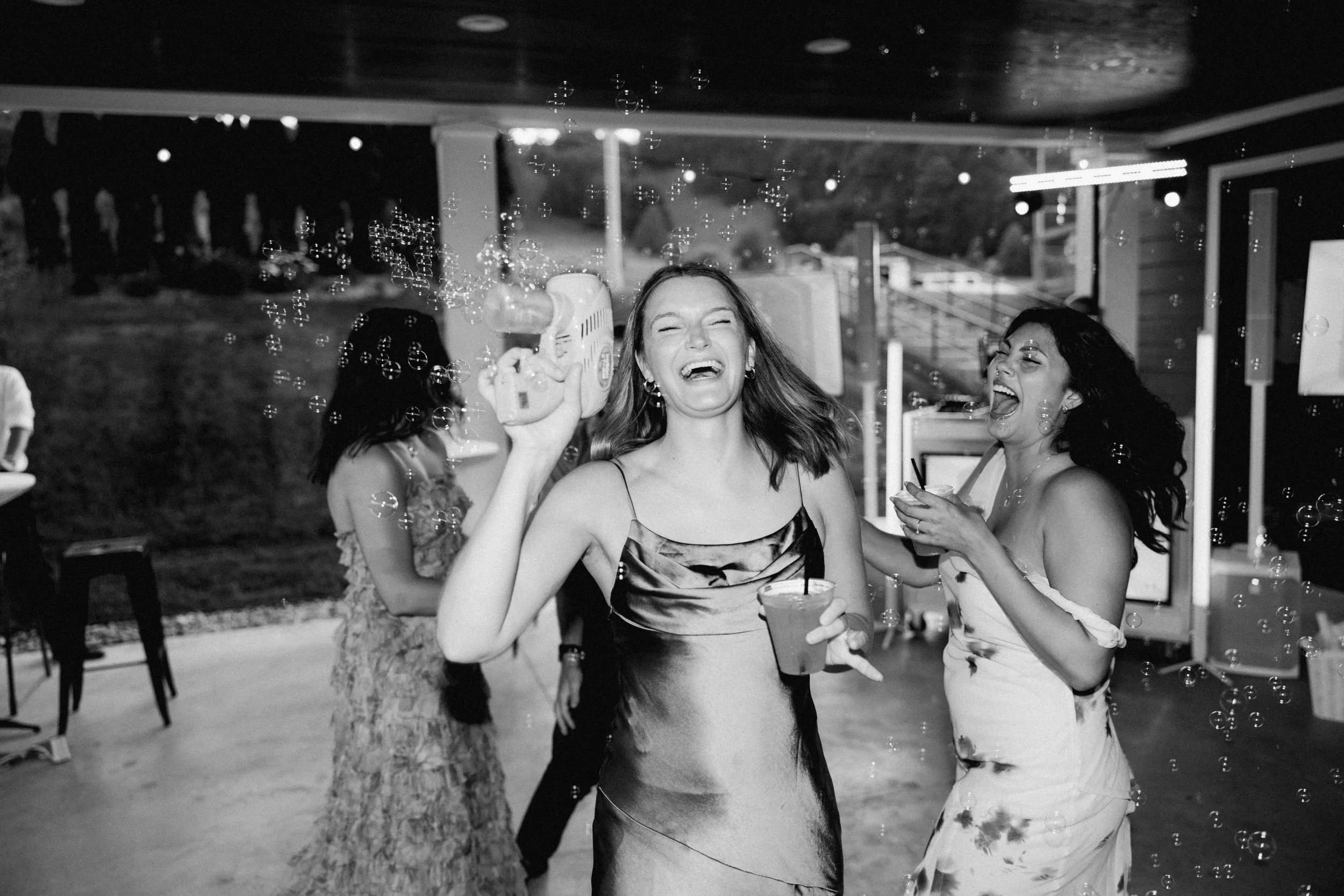 wedding guests laughing