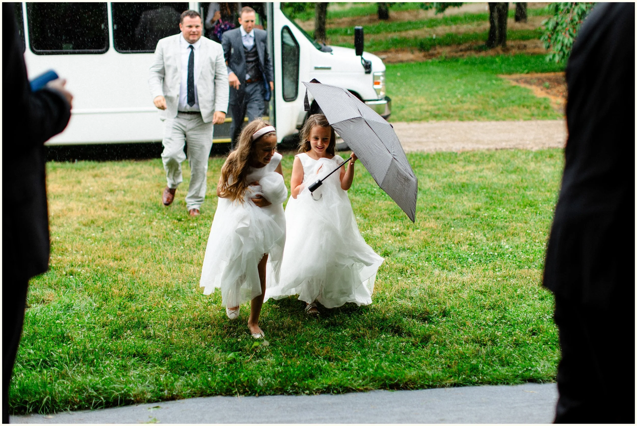 flower girls in the rain