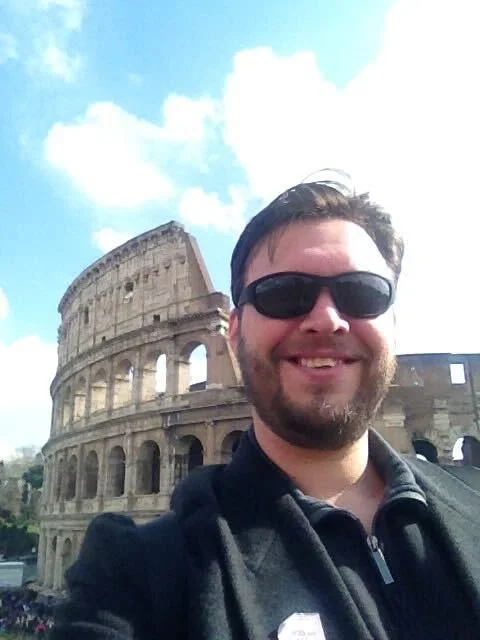 Sound Designer, Ezra Walker near the Roman Colosseum.