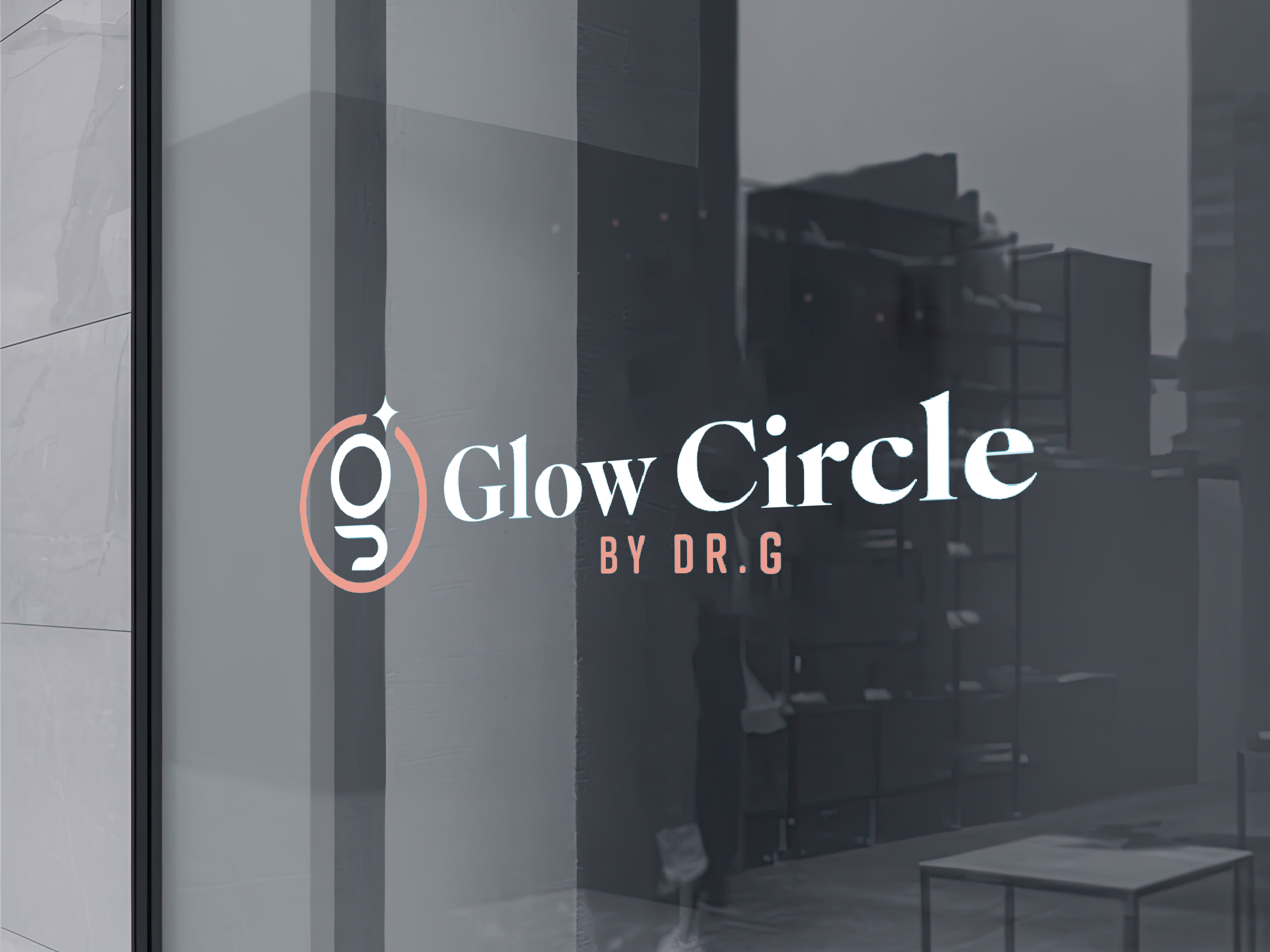 Glass window with a logo for Glow Circle by Dr. G, featuring a stylized glowing circle with letters g and o inside, and the text 'Glow Circle by Dr. G' in white and pink.