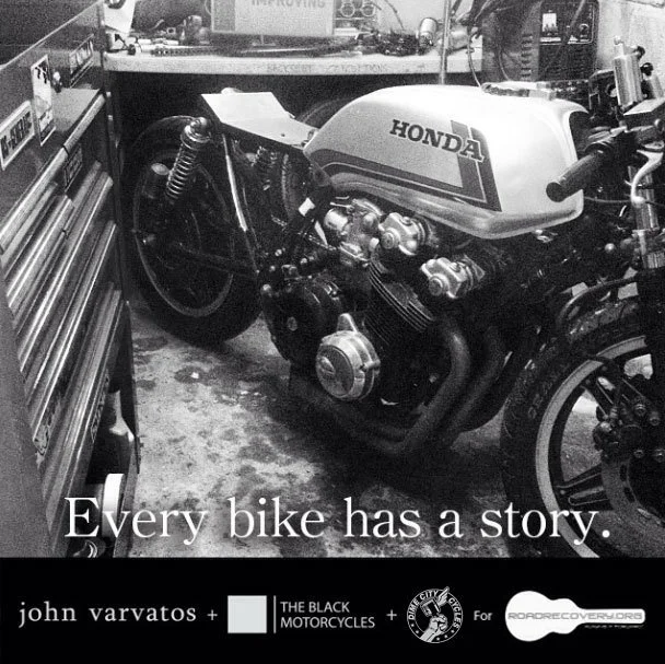 A black and white photo of a vintage Honda motorcycle in a workshop or garage, next to a tool chest. The caption reads: 'Every bike has a story.'