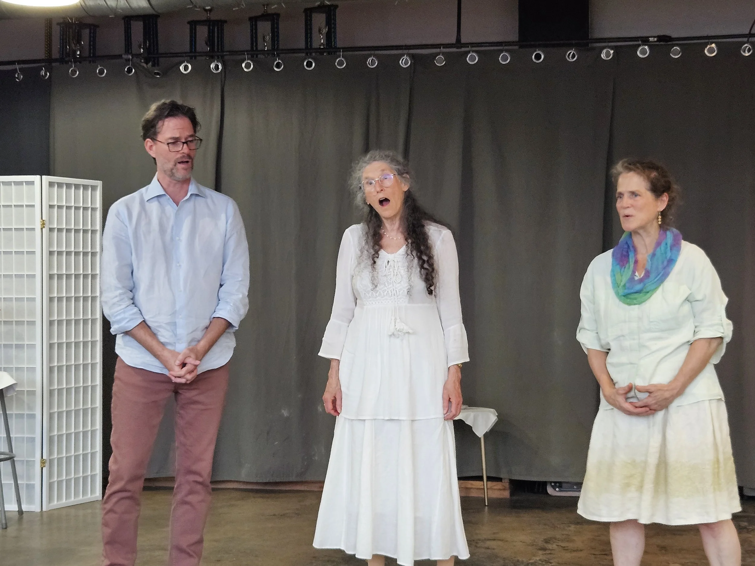 Patrick, Eleanor, and Sara raise their voices in song