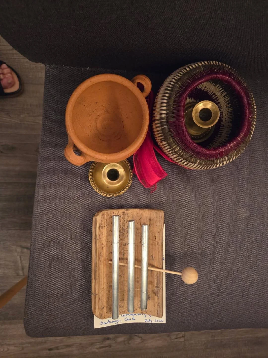 Clay pots and brass candle holders from Cali and a mini-xylophone from Santiago, Chile
