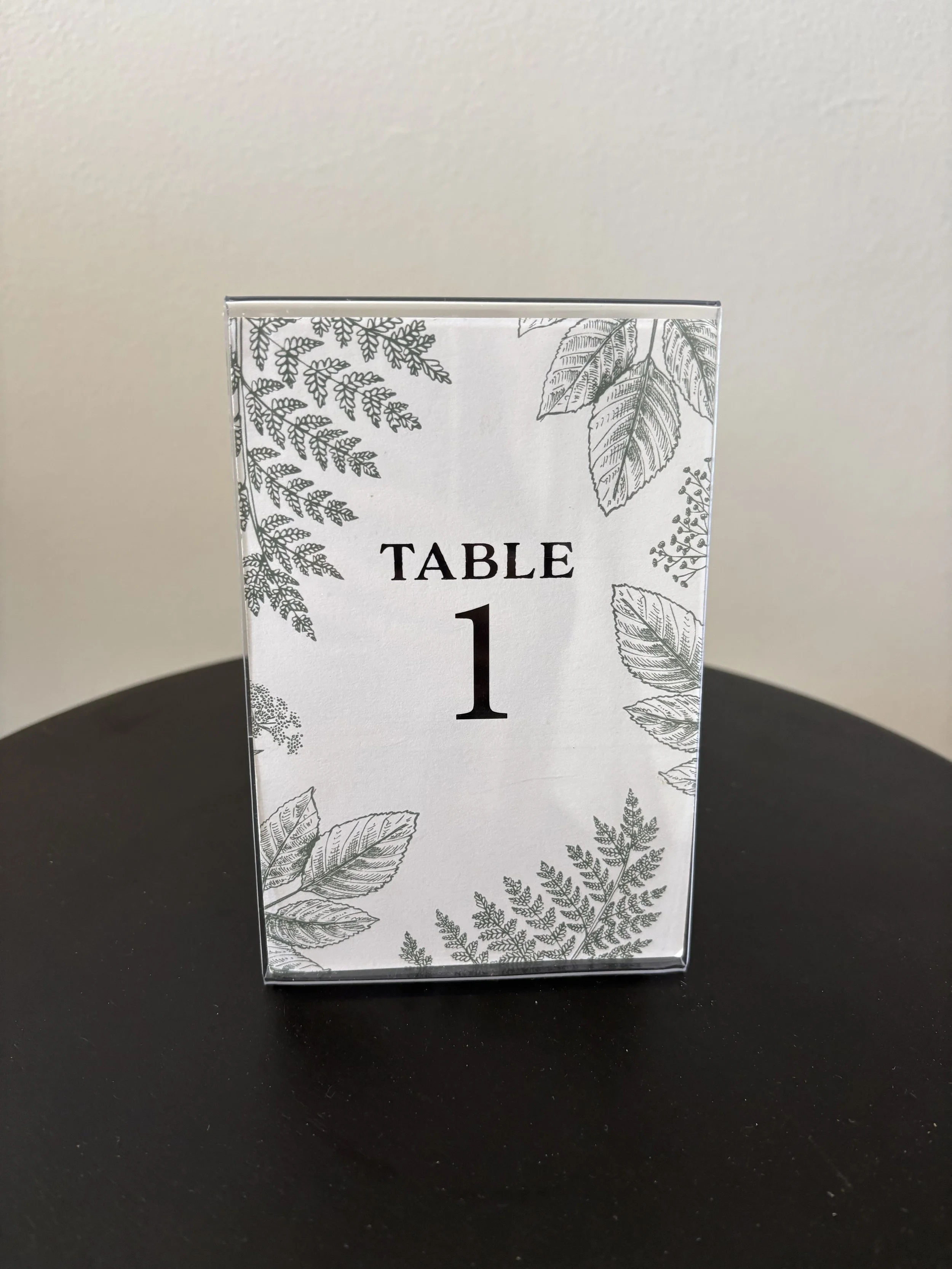 Clear Stand with Green Leaf Number $1.00ea
