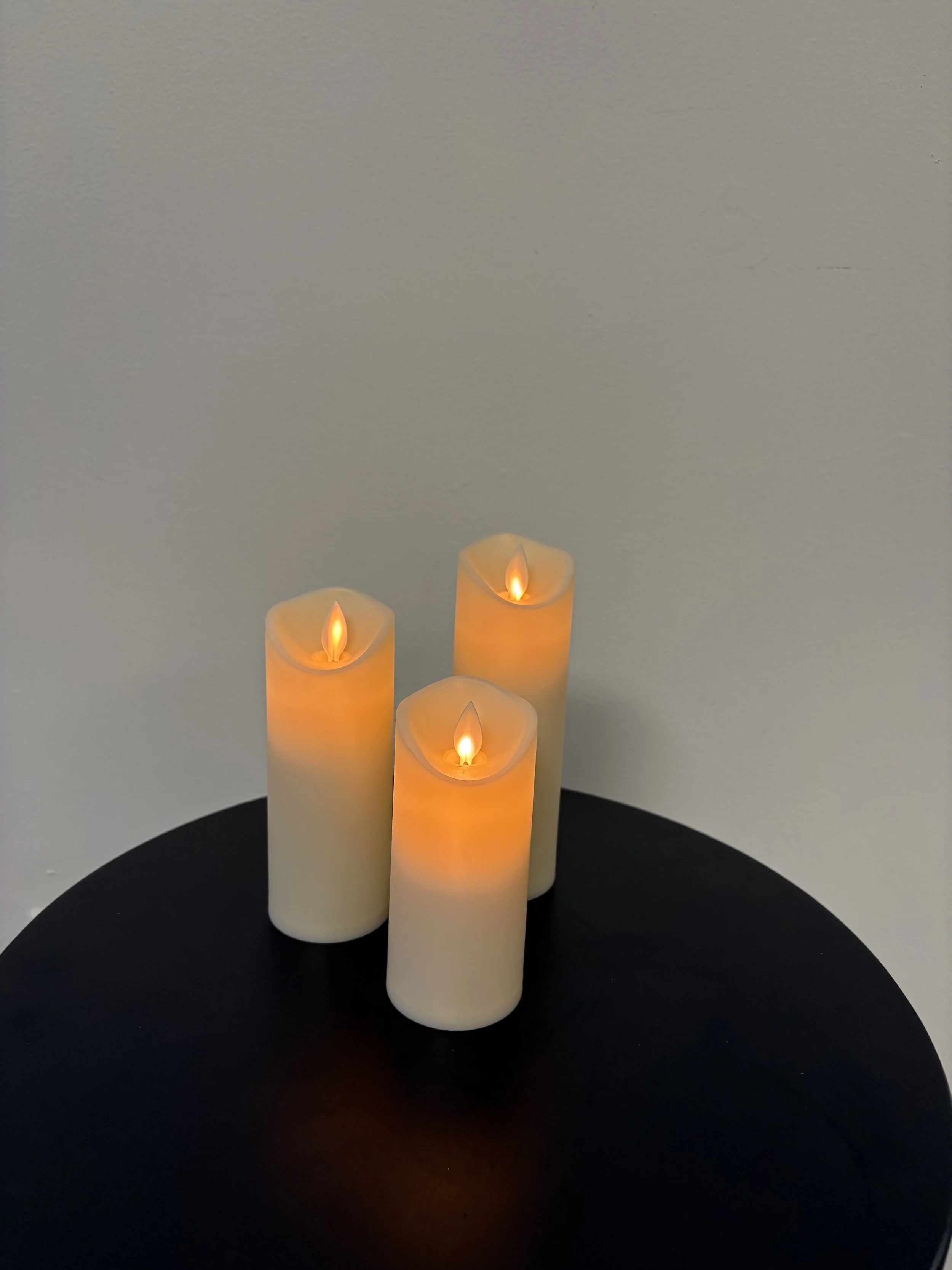 LED Ivory Pillar Flickering Candle $1.25 each 
outside is plastic 