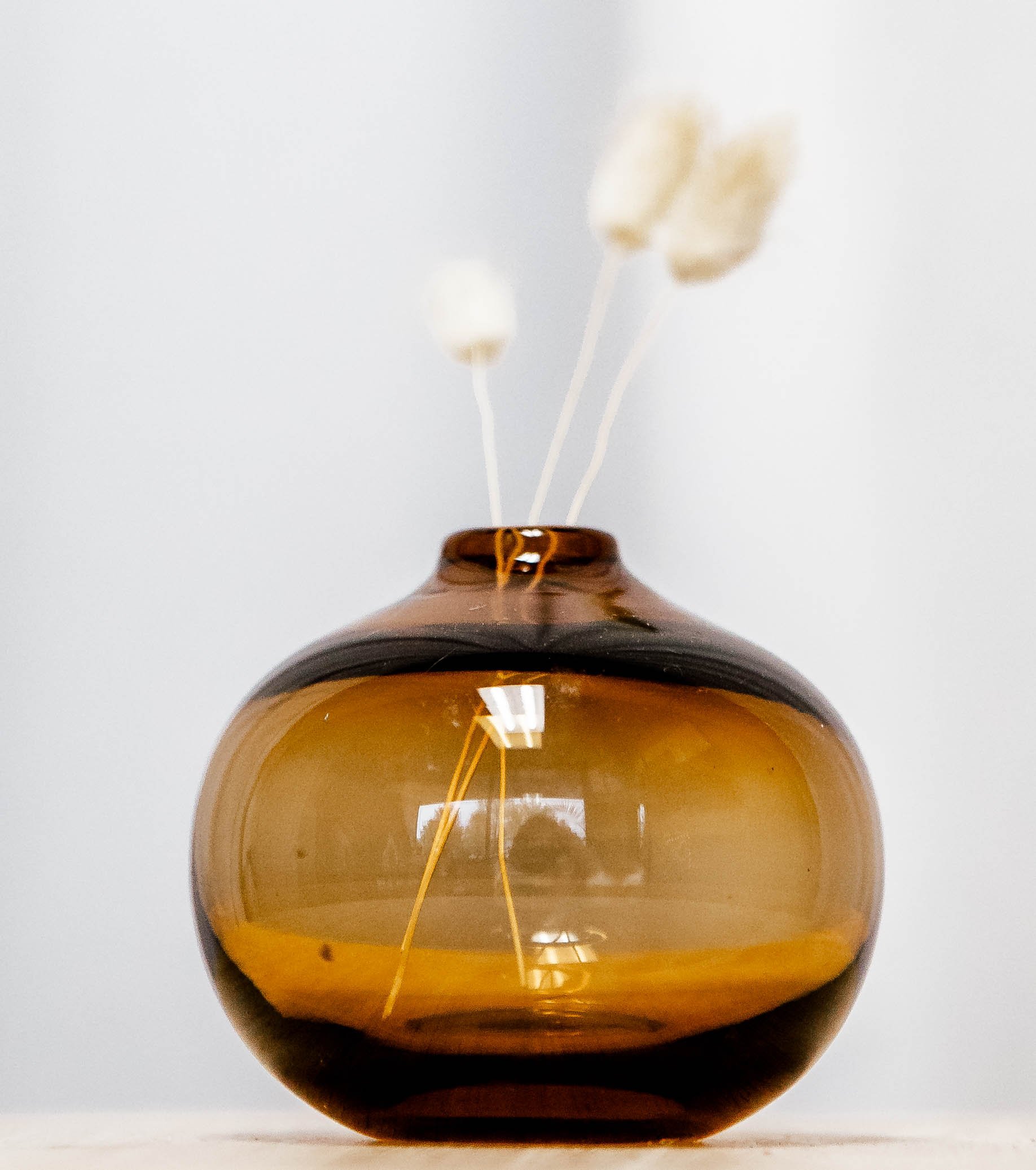 Round Amber Bud Vase $1.25