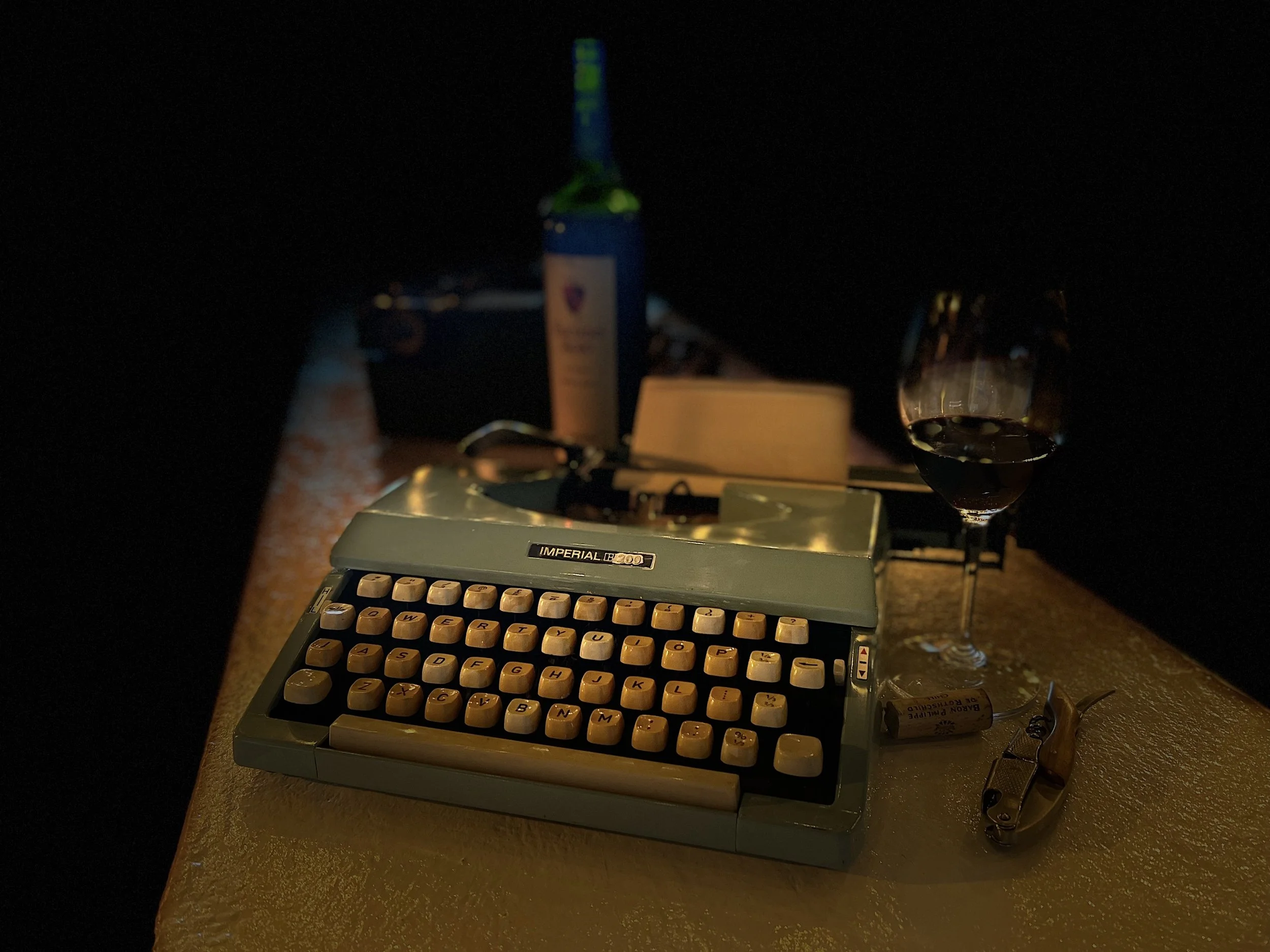 moody typewriter and wine.jpg