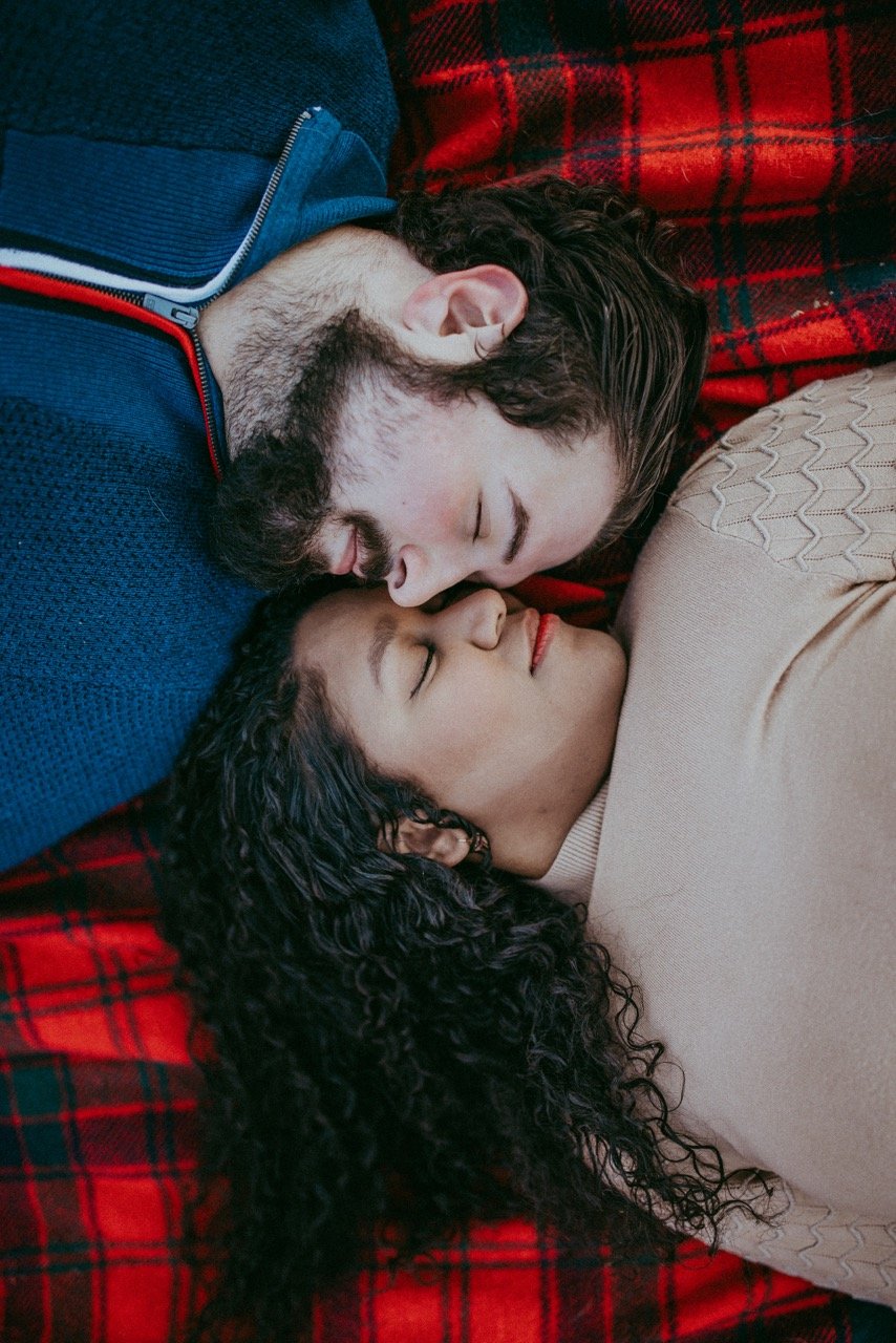 Couple session whipped cream, sand dunes west greenwich rhode island picnic kissing lake fall colors forest pine trees new england couple photographer quarry red flannel blanket scottish laying down eyes closed