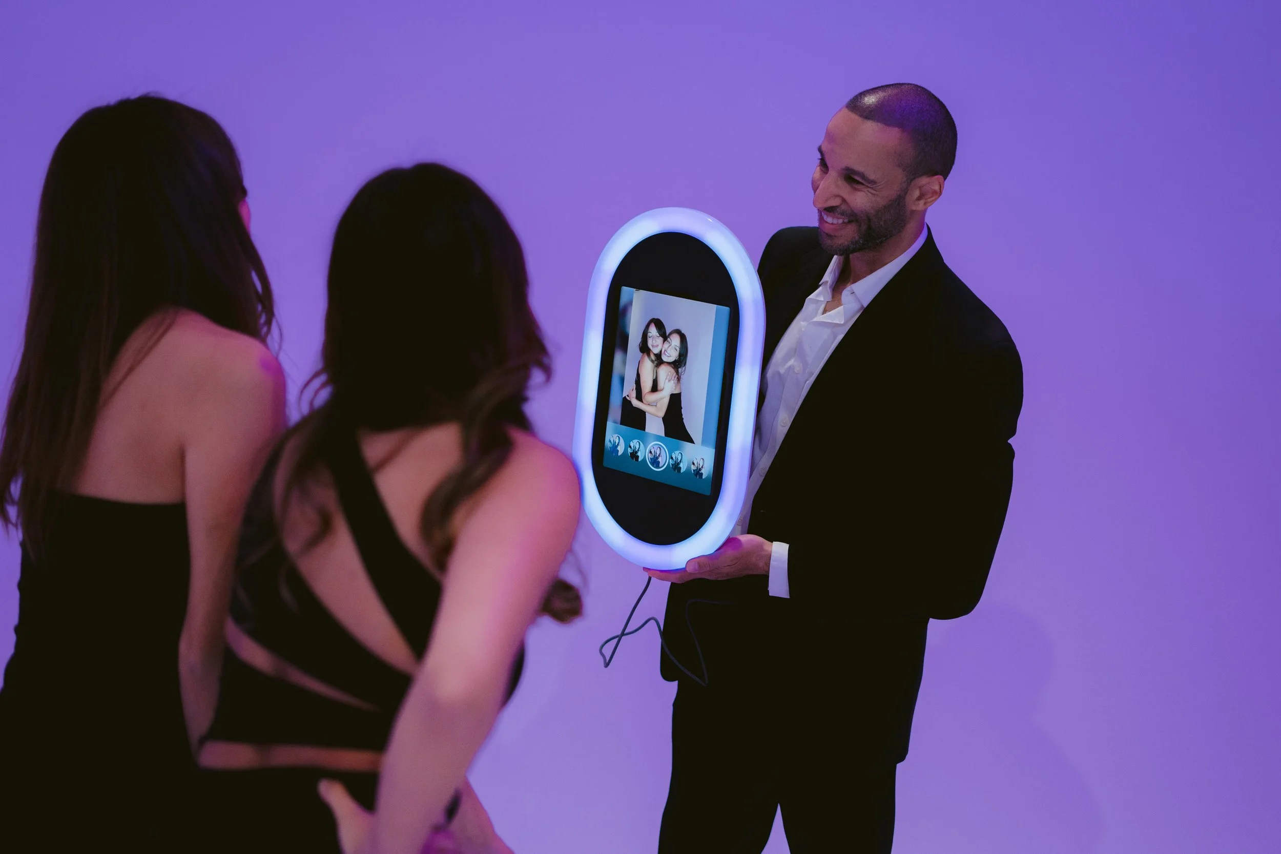 Opto Booth Go digital sharing experience at an evening wedding reception