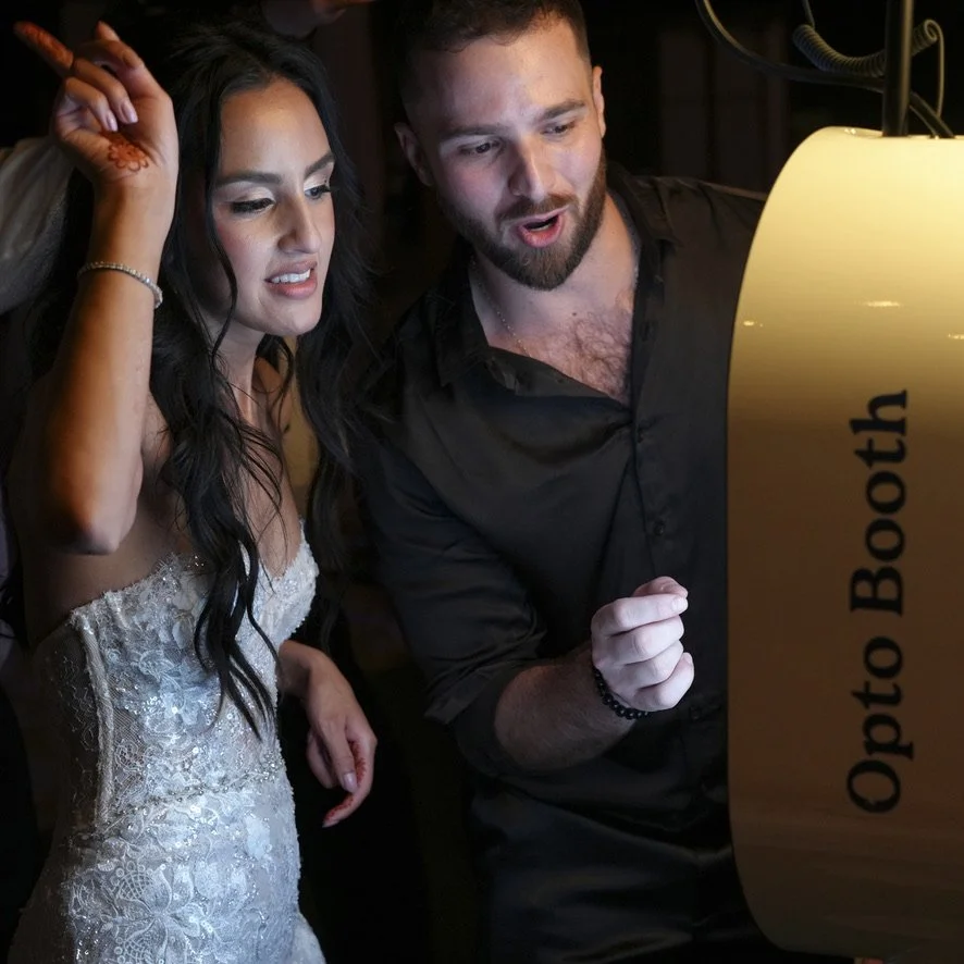 Wedding guests recording video messages with Opto Booth Pro in Los Cabos