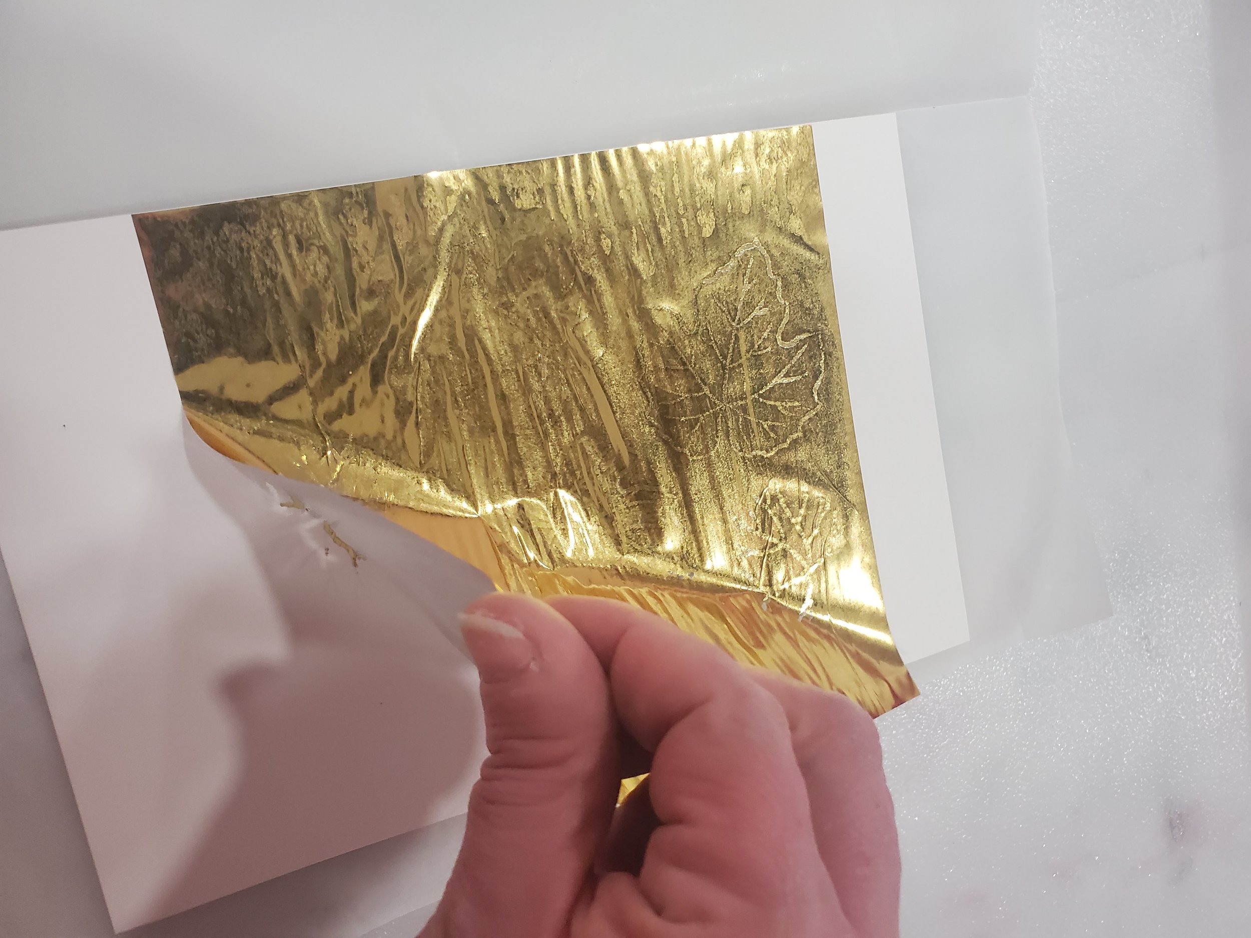 Remove excess foil