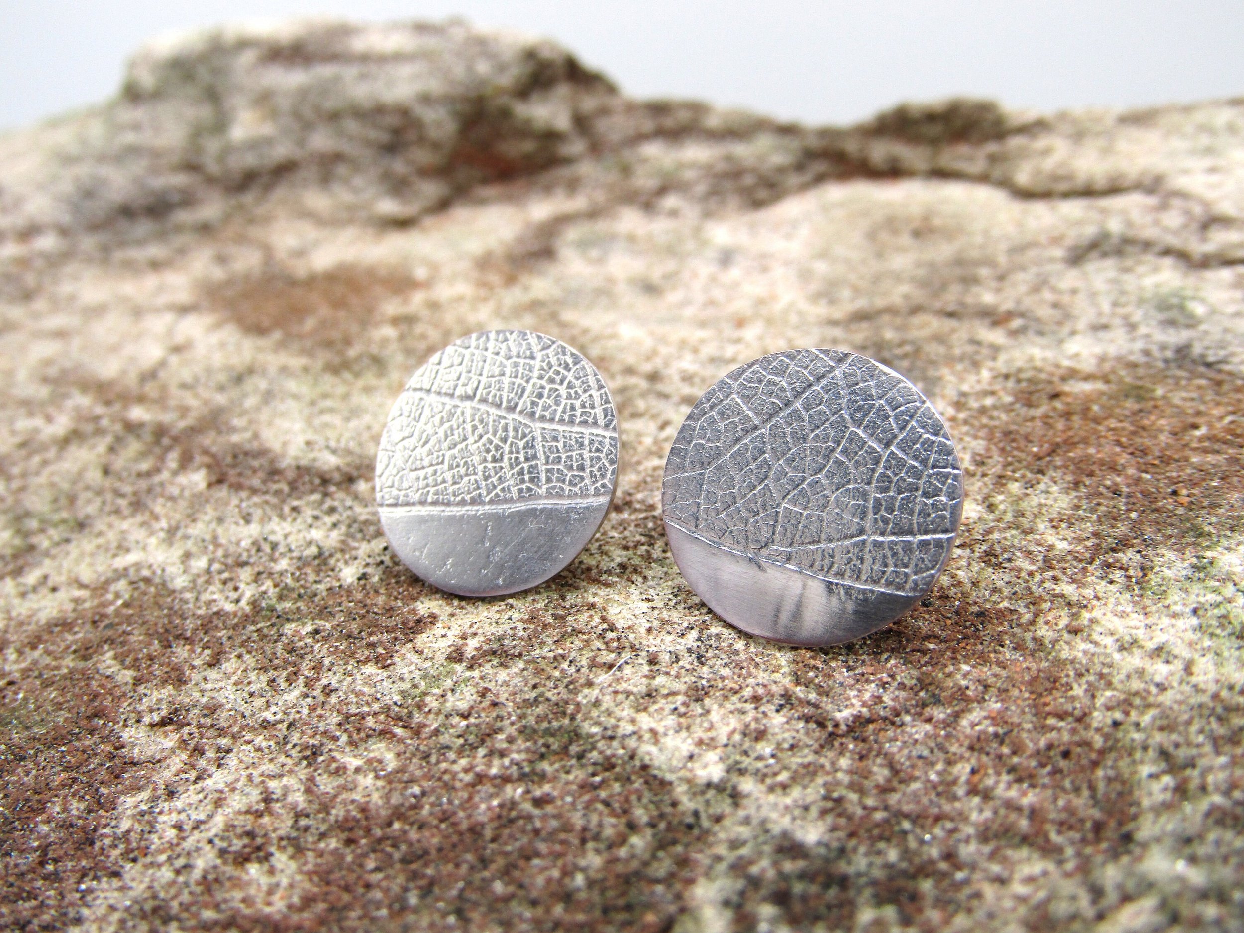 Silver stud earrings with leaf texture/J is for Jewellery