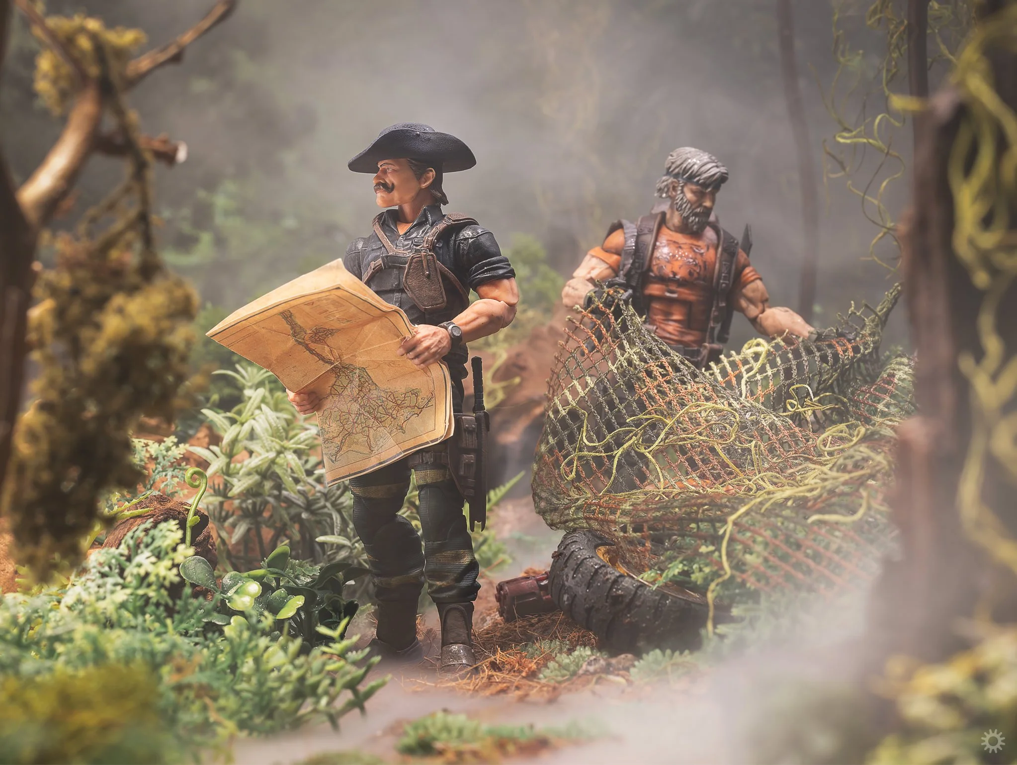 G.I. Joe Classified Tiger Force Recondo reviewing a map while Outback hides the Tiger RAM Cycle under a camouflaged net somewhere in the jungles of Sierra Gordo