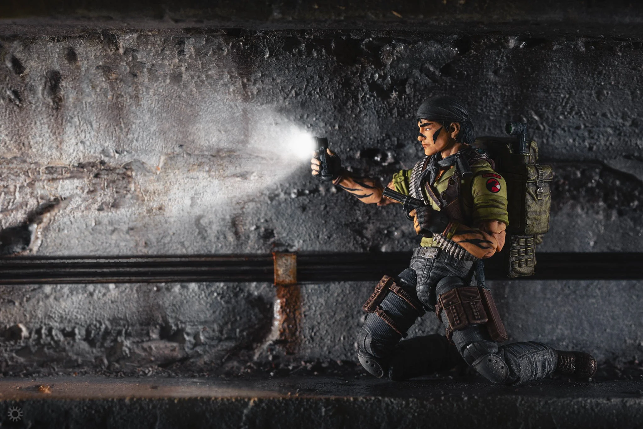 G.I. Joe Classified Tunnelrat shining a flashlight in a subterranean tunnel under the surface of Cobra Island