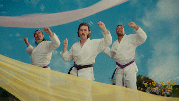 group of karate men dancing