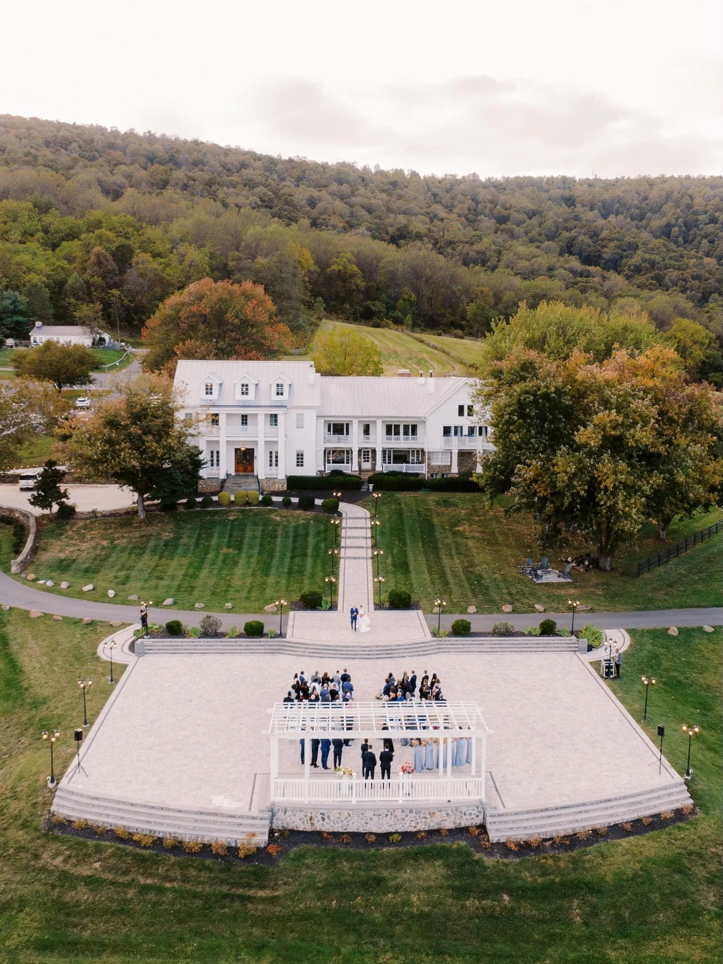 These two, that view, and a whole lot of color. 
M+B&rsquo;s wedding was all about making it feel like them: joyful, laidback, and just the right amount of bold. From aisle meadows to a sweetheart table full of light, every detail was there to let th