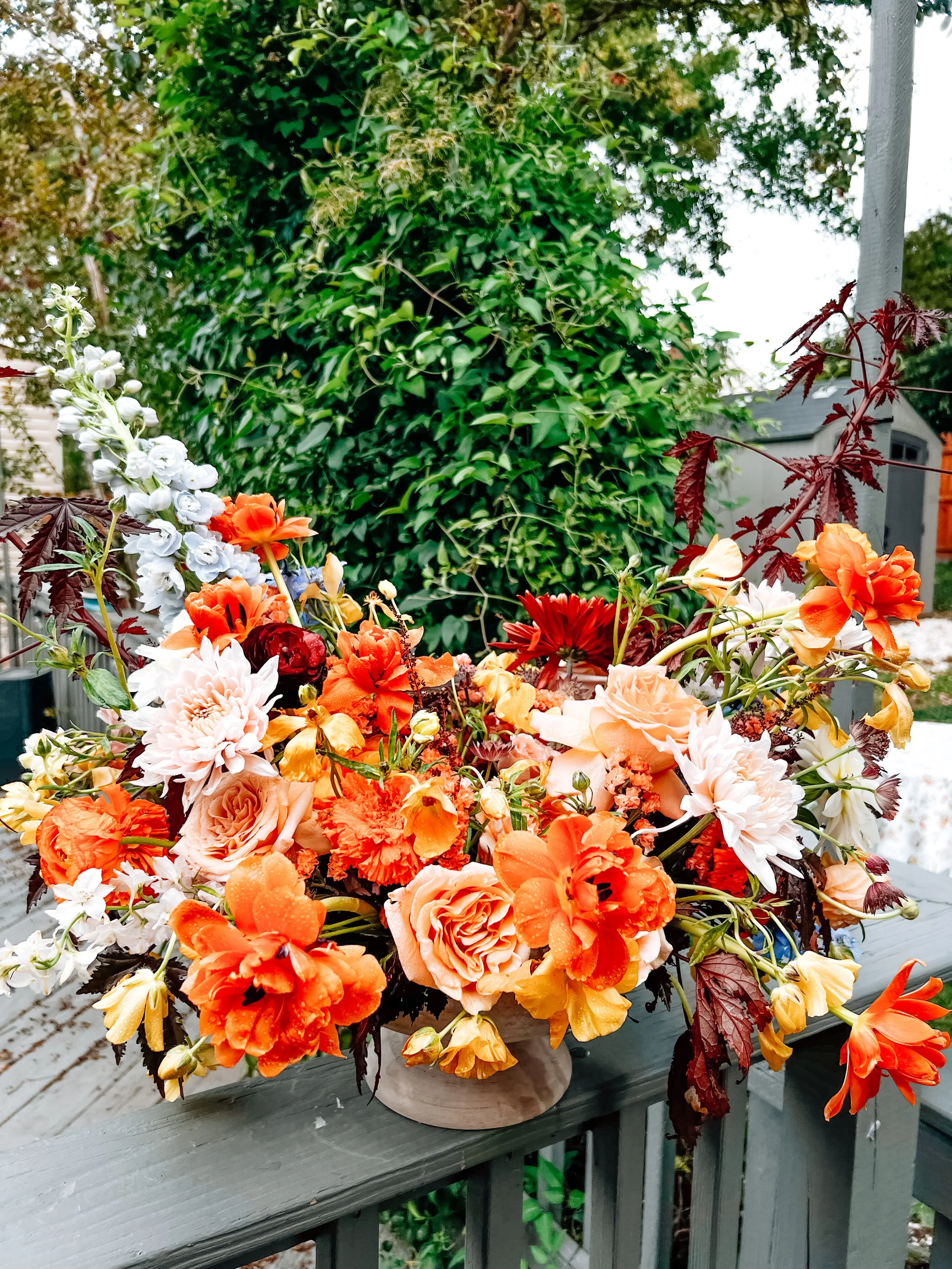 Seasonal luxury floral arrangement in warm coral tones by Northern Virginia florist.