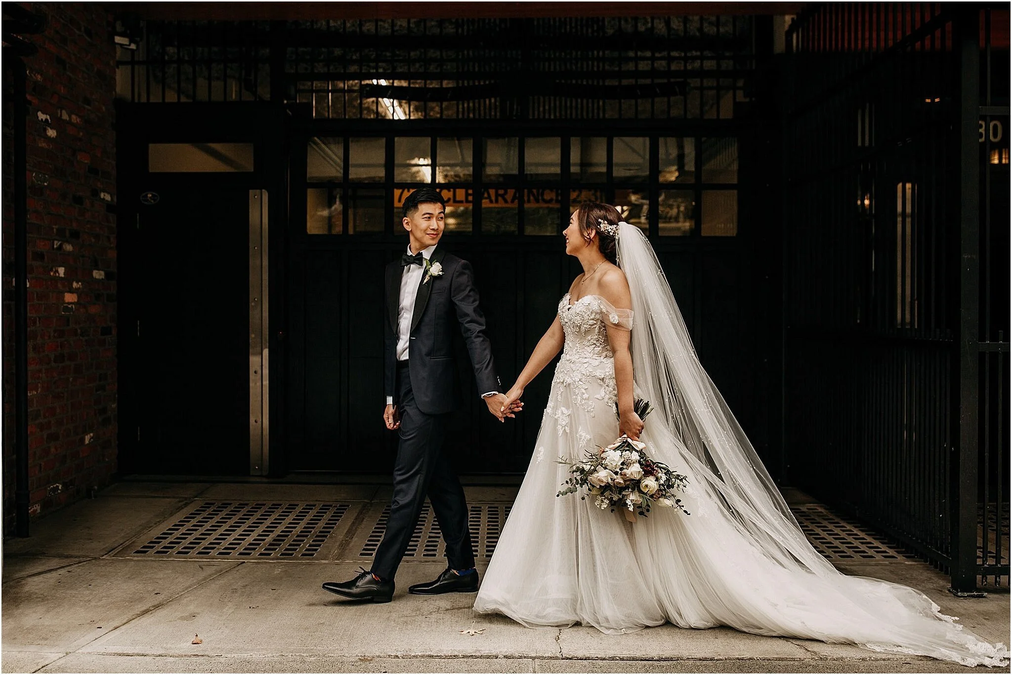 bride and groom walking vancouver bc