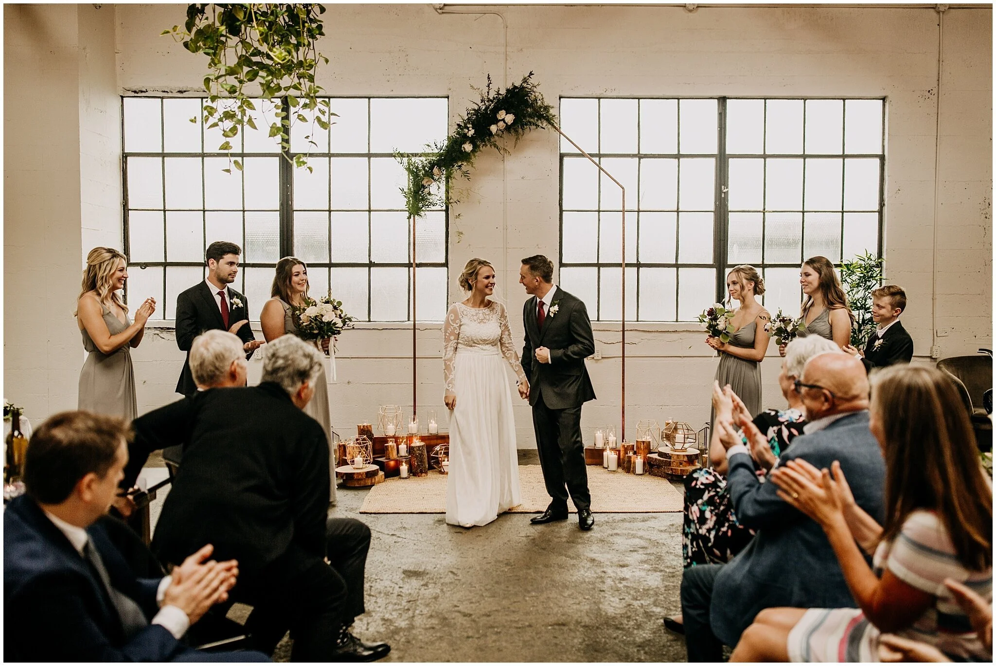 bride and groom ceremony exit at settlement building wedding