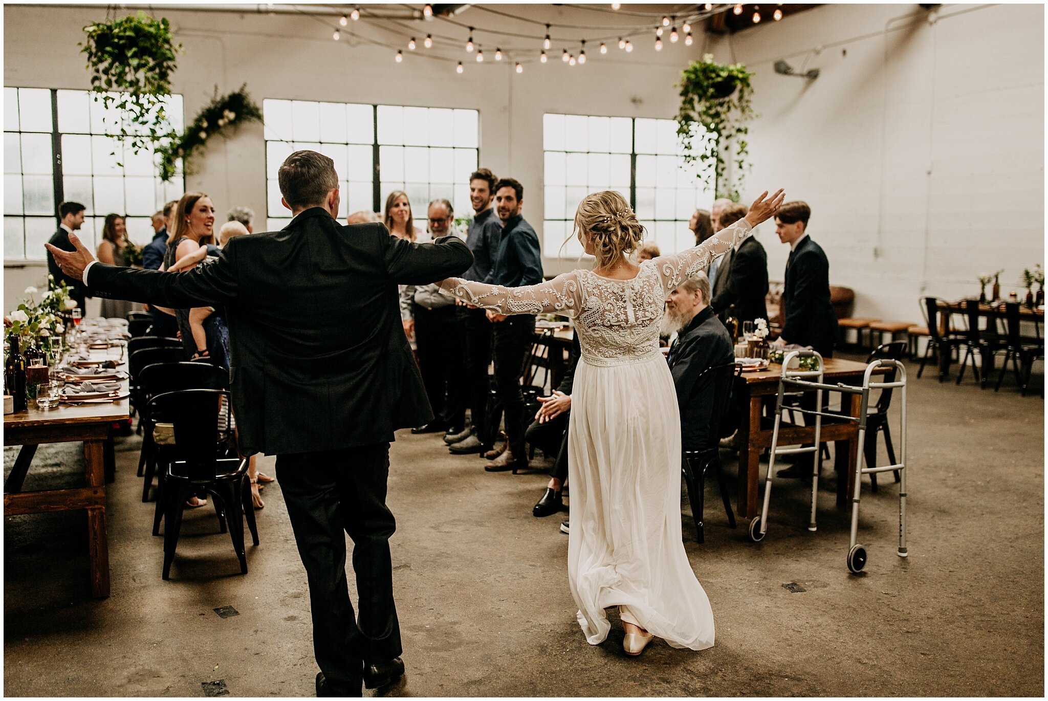 bride and groom reception entrance at settlement building