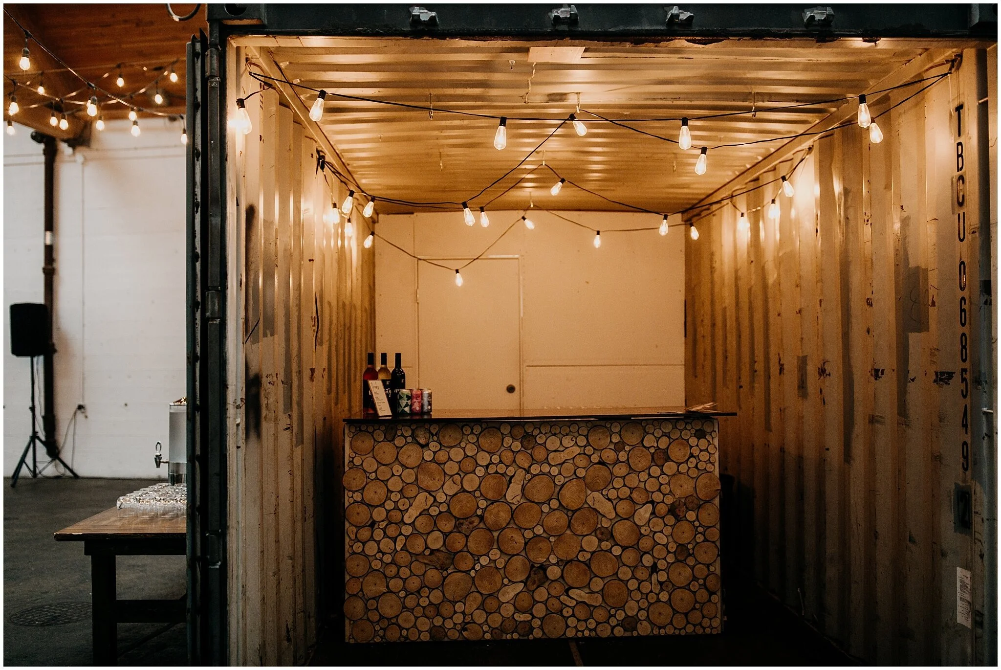 settlement building shipping container bar 