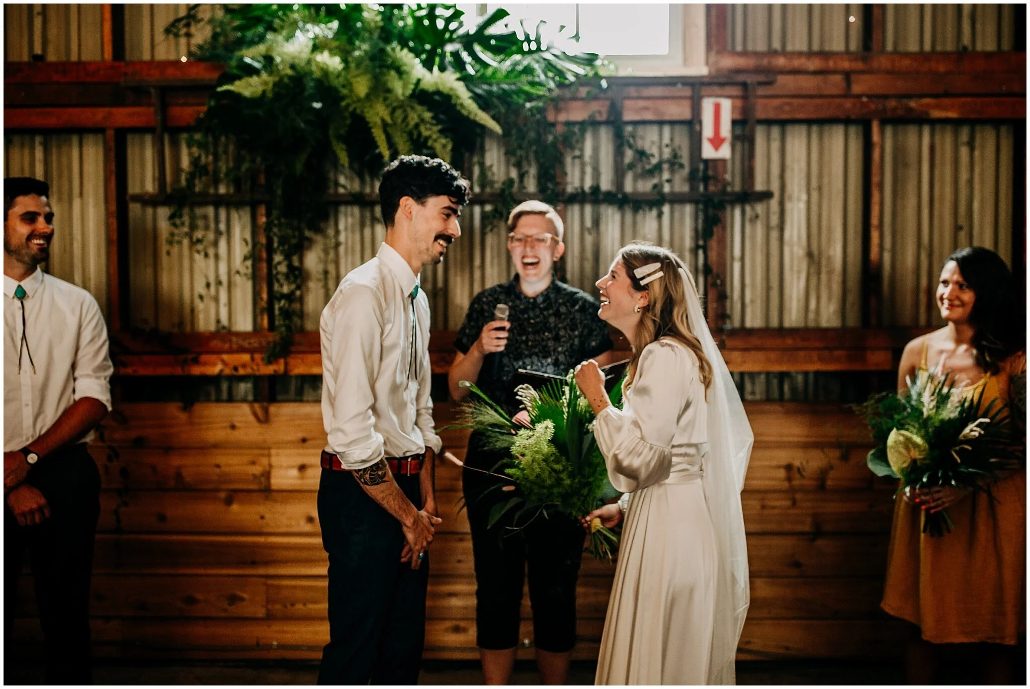 bride and groom at altar at ellis building wedding