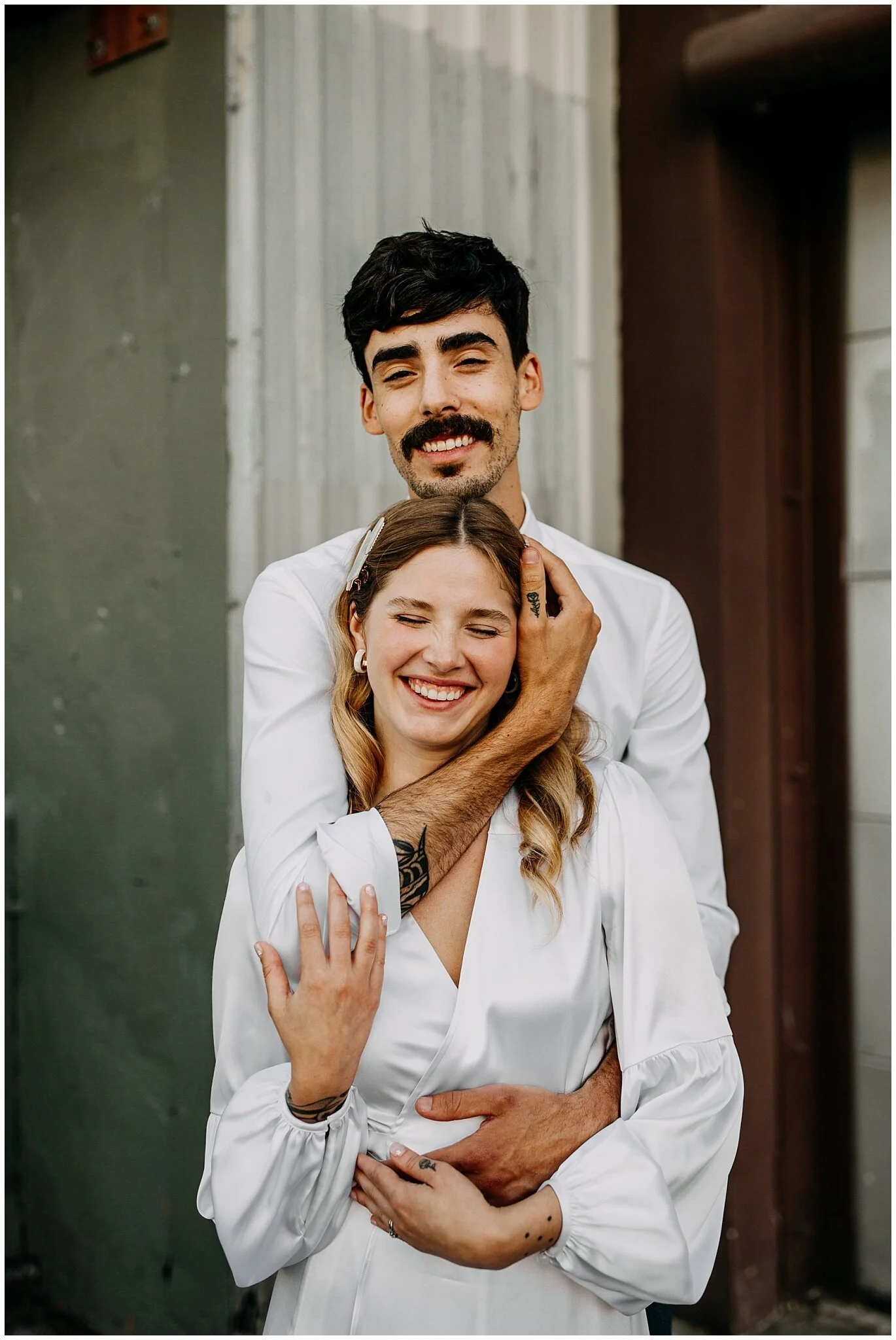 bride and groom portrait in the city at ellis building wedding