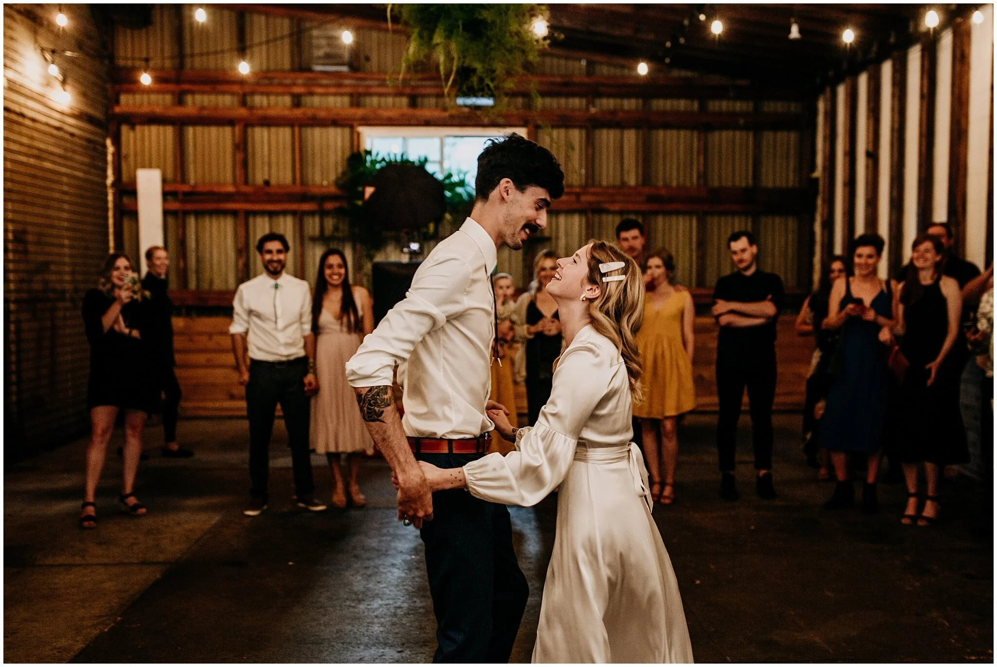 bride and groom first dance at ellis building wedding