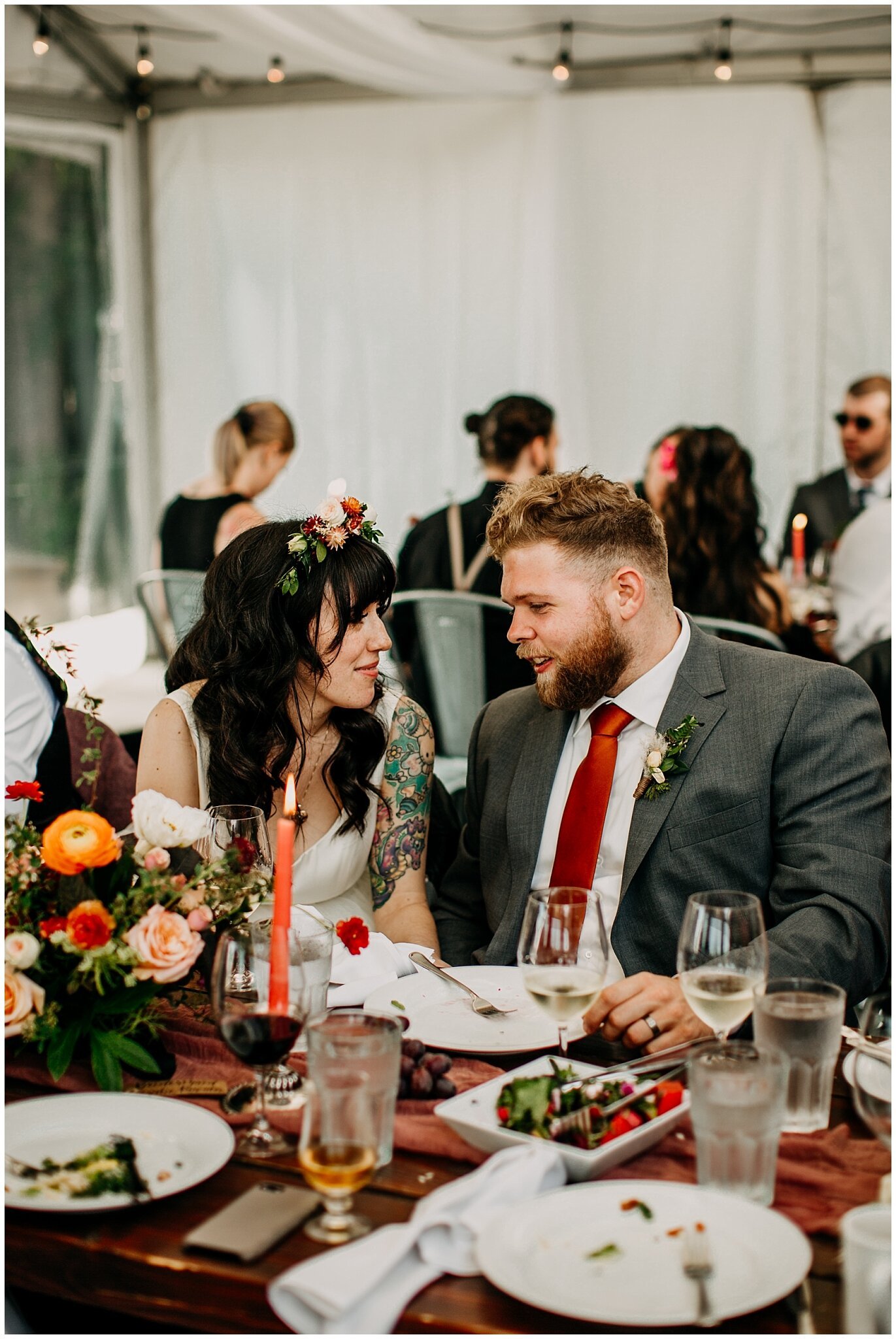 bride and groom candid at reception at sea cider farm and ciderhouse