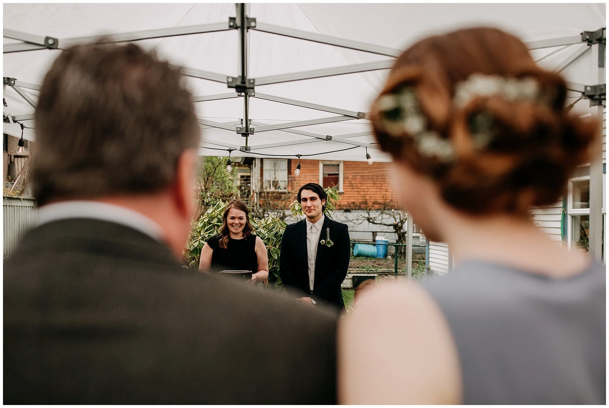groom seeing bride at ceremony at backyard elopement vancouver