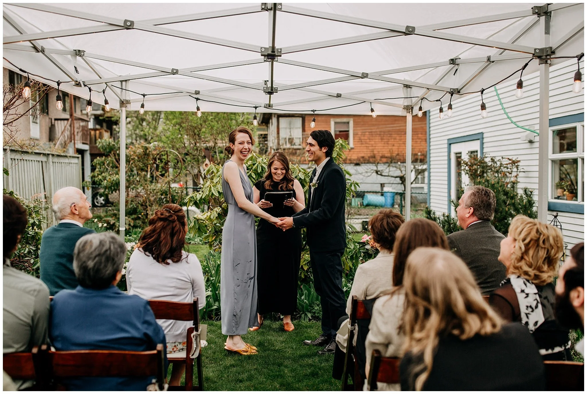 bride and groom at ceremony in backyard vancouver