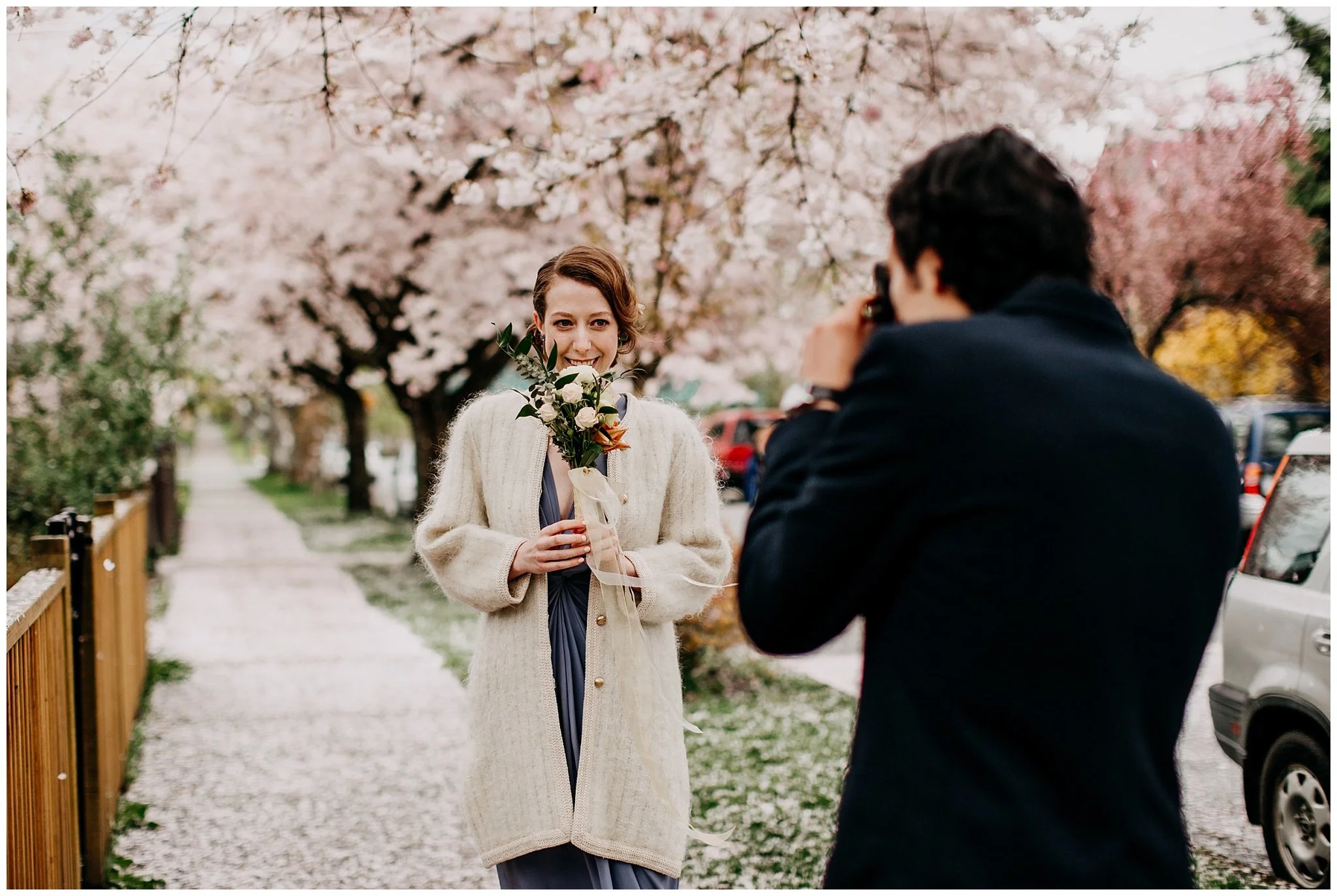 groom taking portrait of bride at vancouver elopement