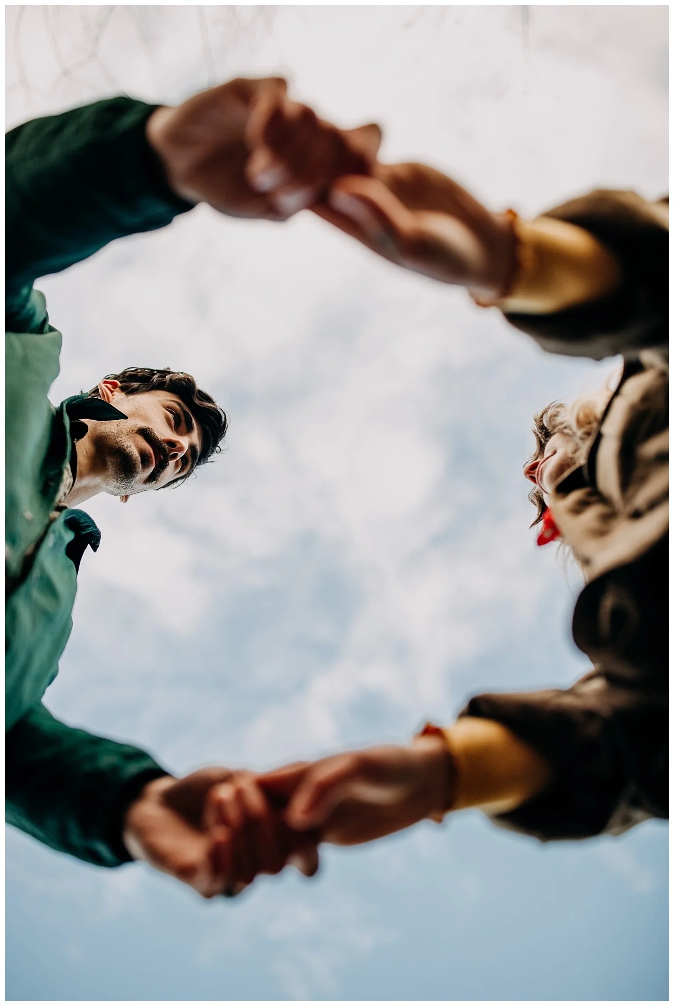 creative perspective of couples hands at jericho beach engagement session