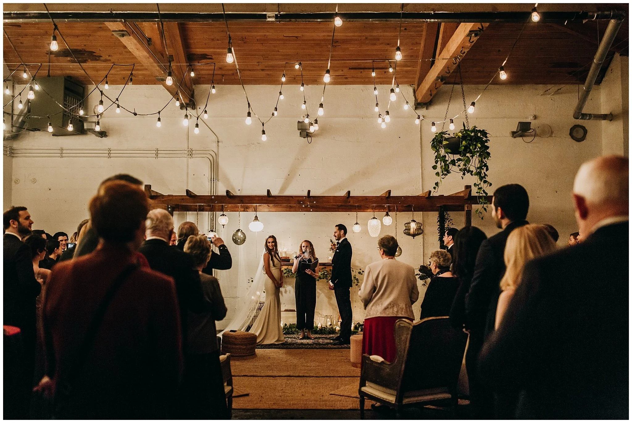 bride and groom wedding ceremony at settlement building