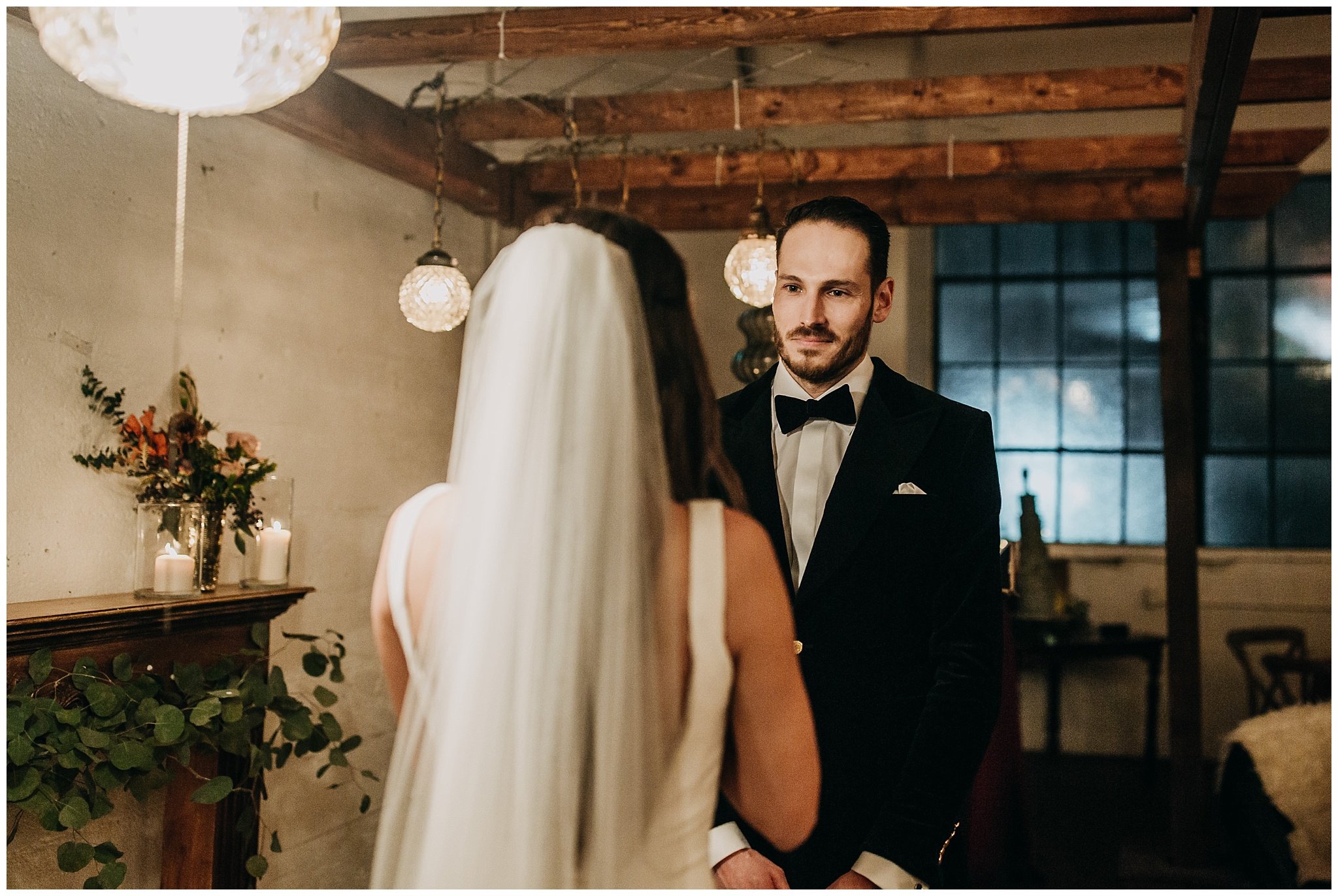 groom's reaction during vow exchange at settlement building wedding