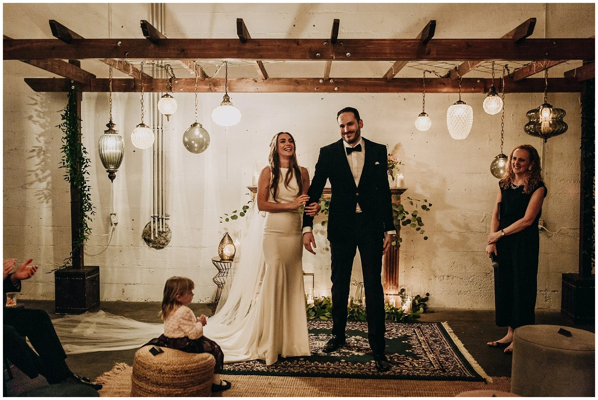 bride and groom ceremony exit at settlement building wedding