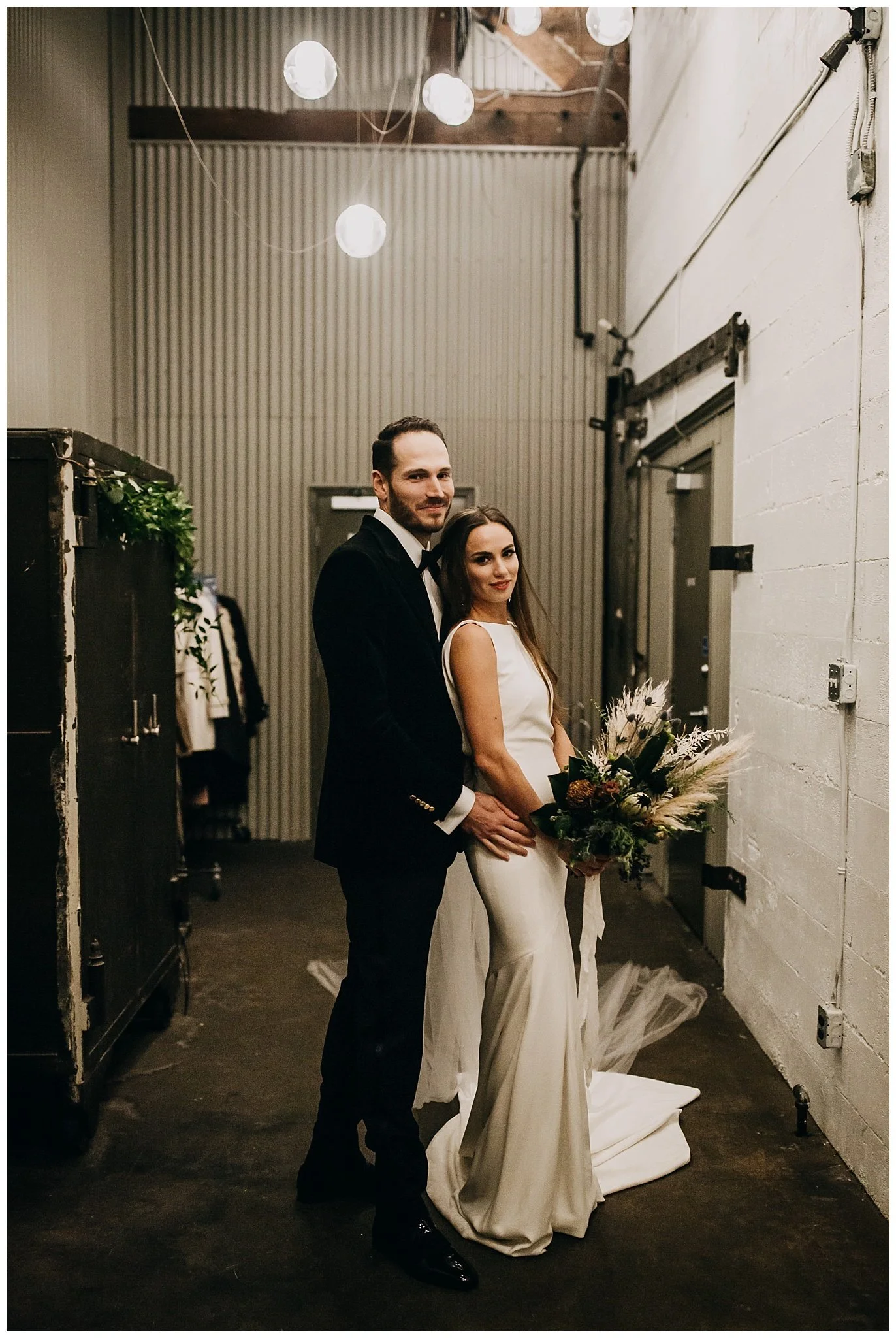 bride and groom wedding portrait at Settlement building wedding