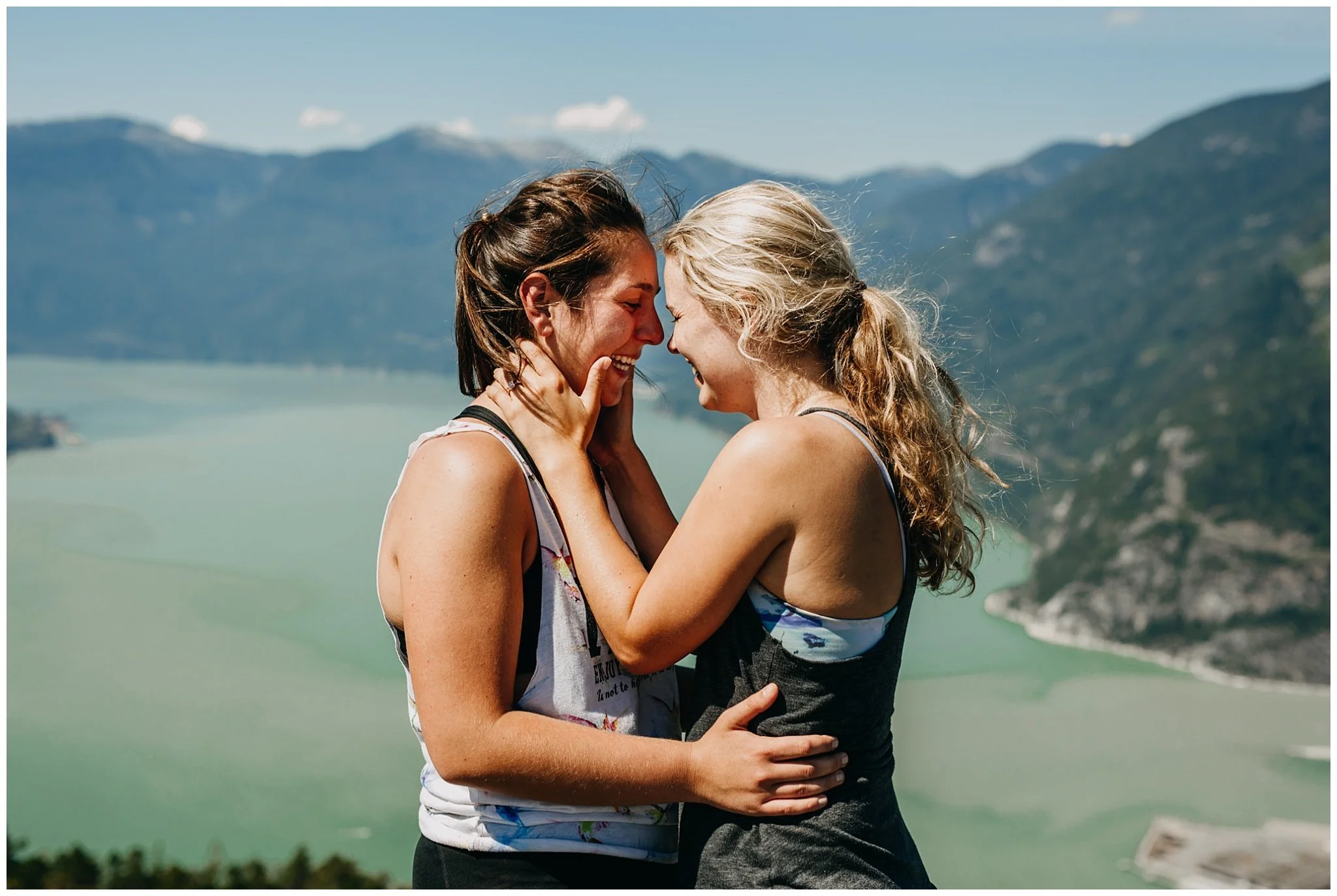 same sex couple portrait on the chief peak in squamish