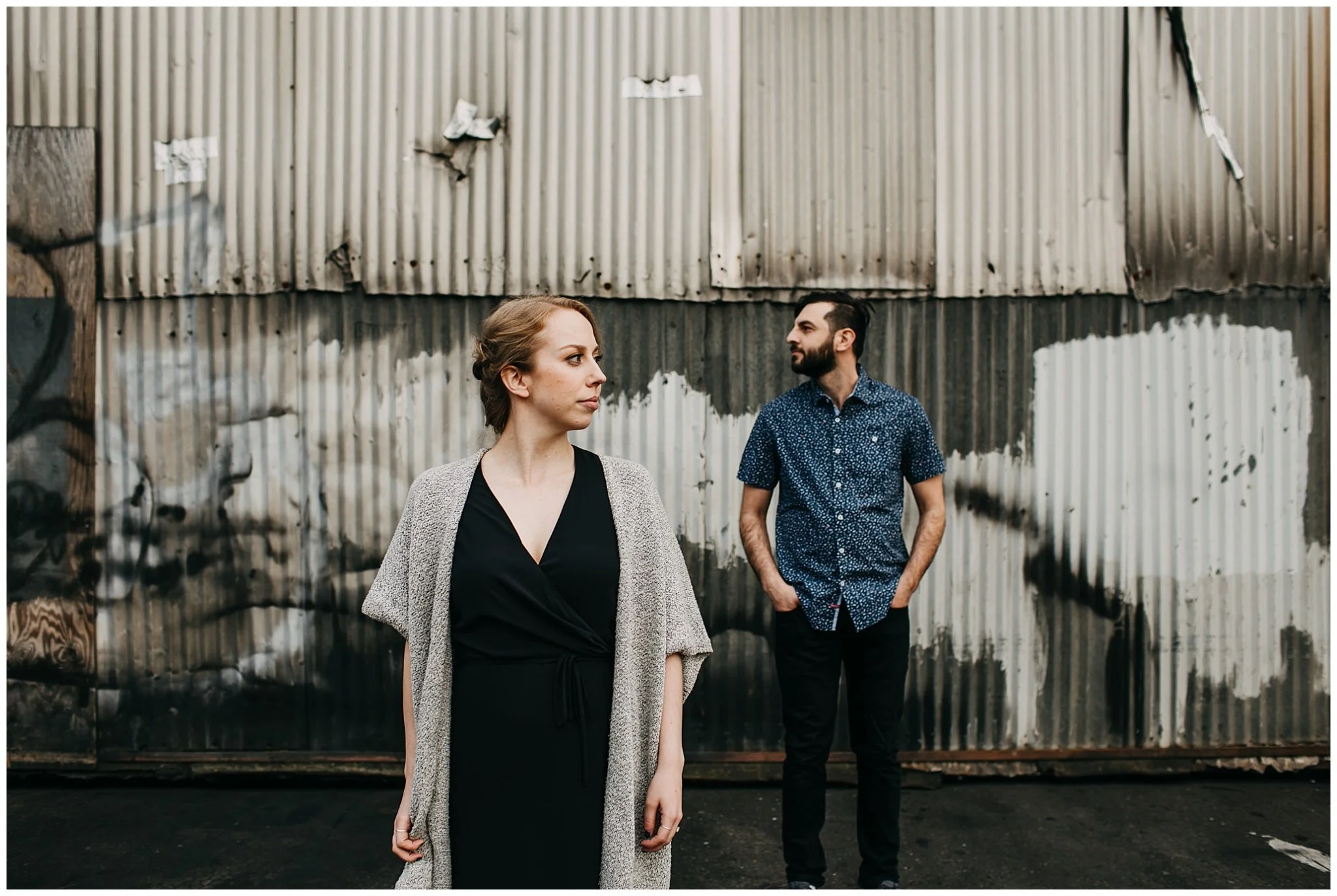 couple in industrial urban setting at downtown new west engagement session