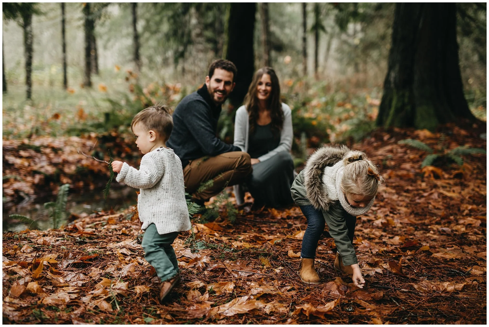 son and daughter kids playing with sticks and leaves chilliwack forest family