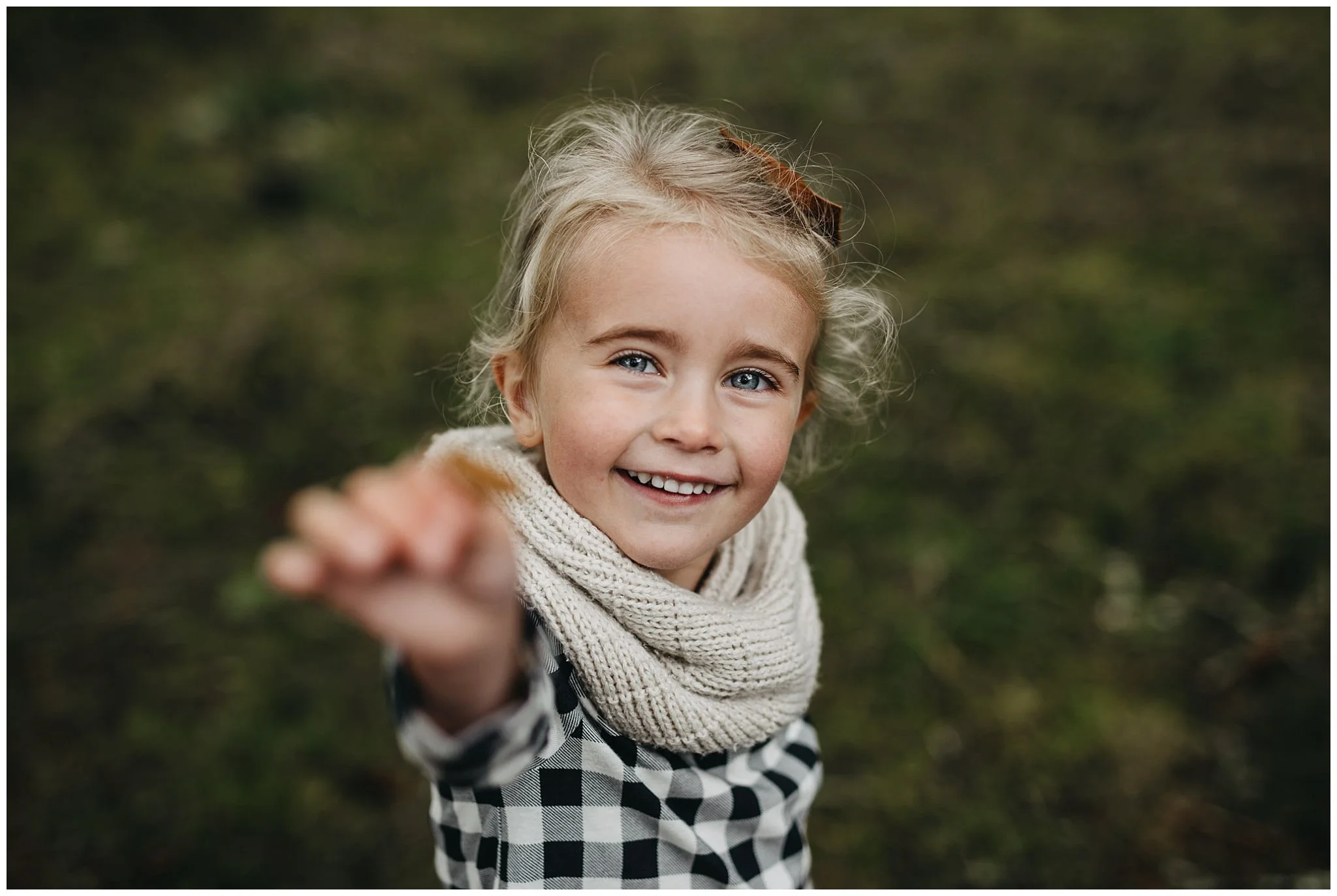 daughter kid holding leaf chilliwack family photos